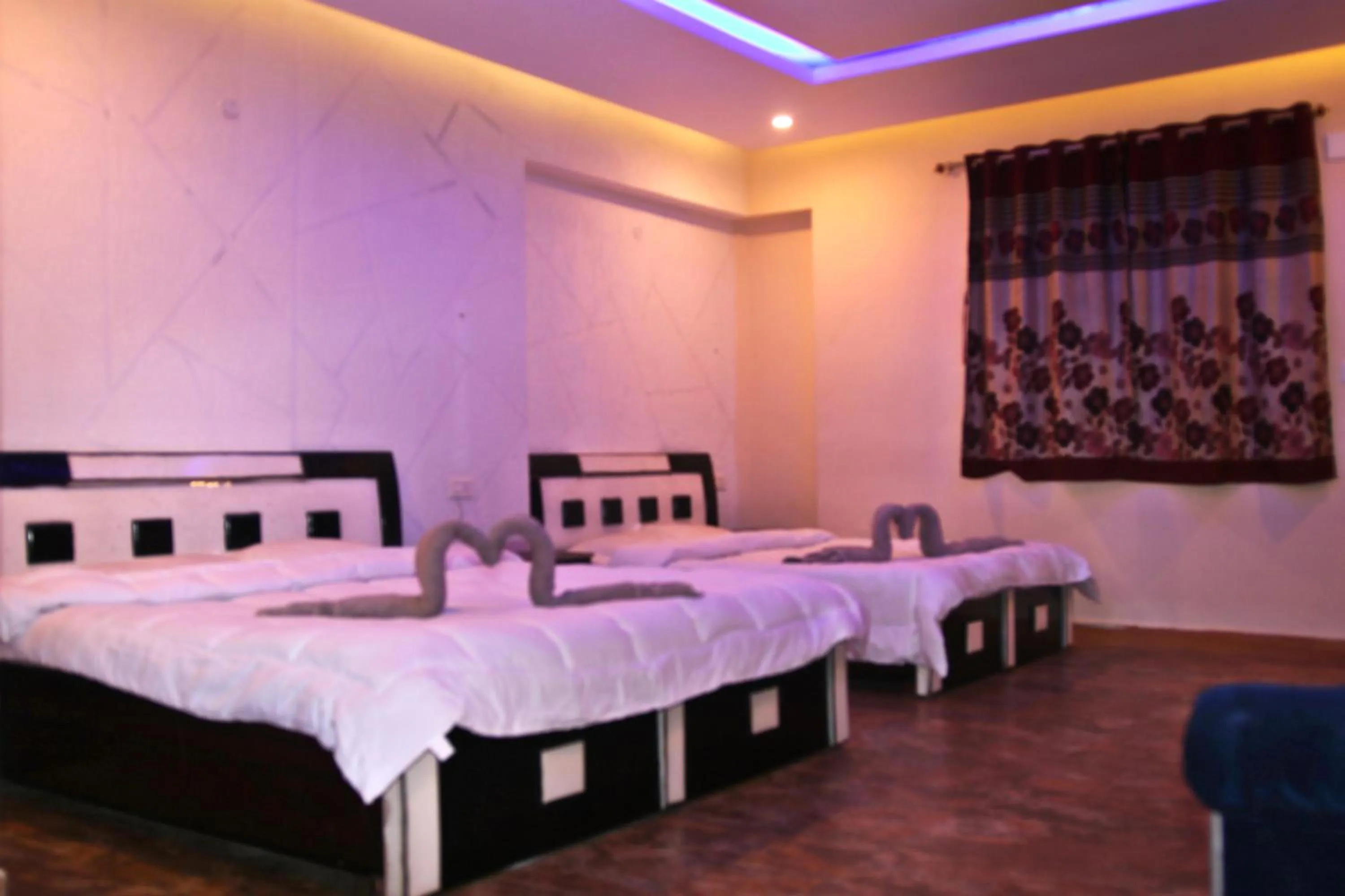 Bed in MAGIC MIST RESORT