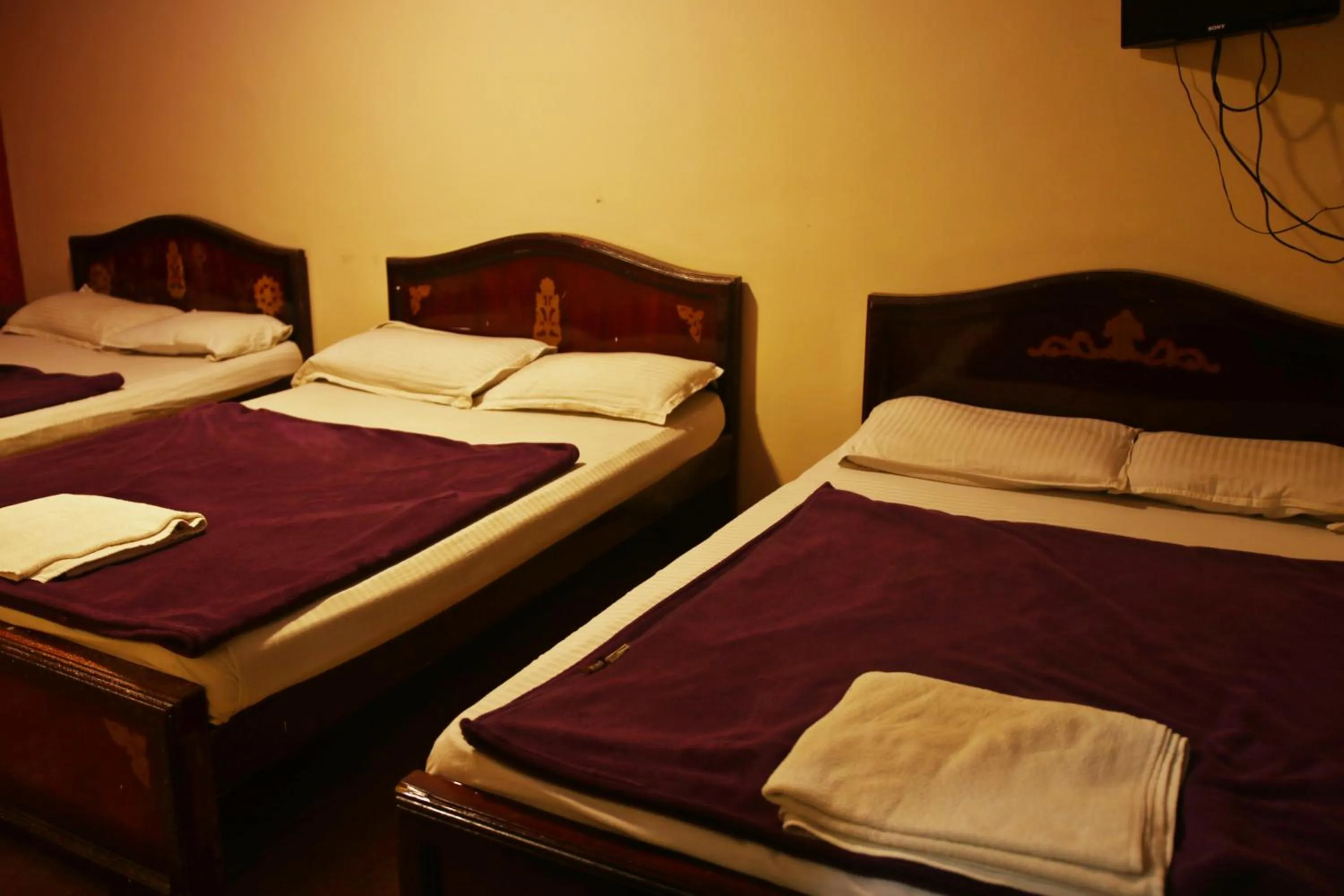 Bed in MAGIC MIST RESORT