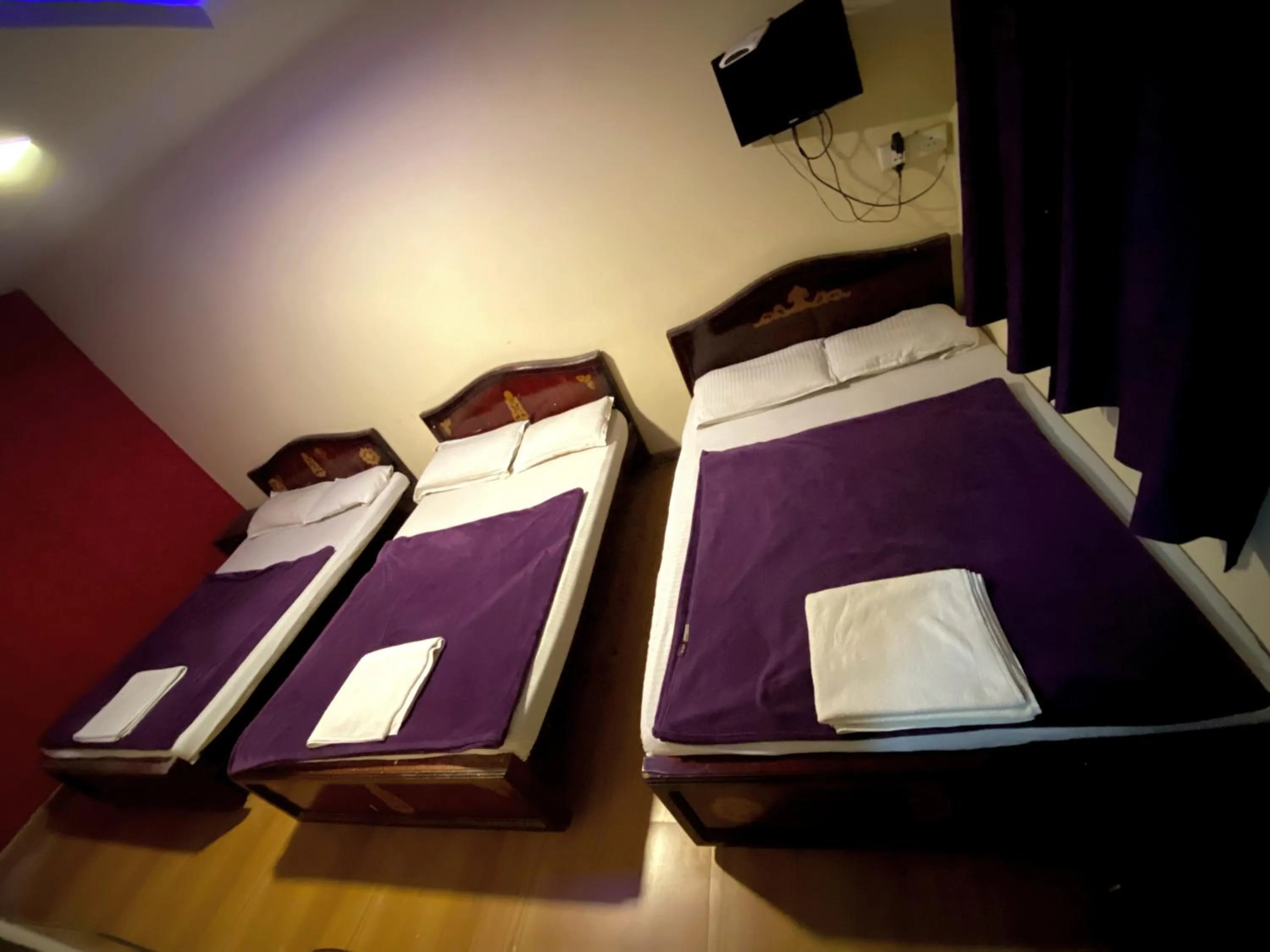 Bed in MAGIC MIST RESORT