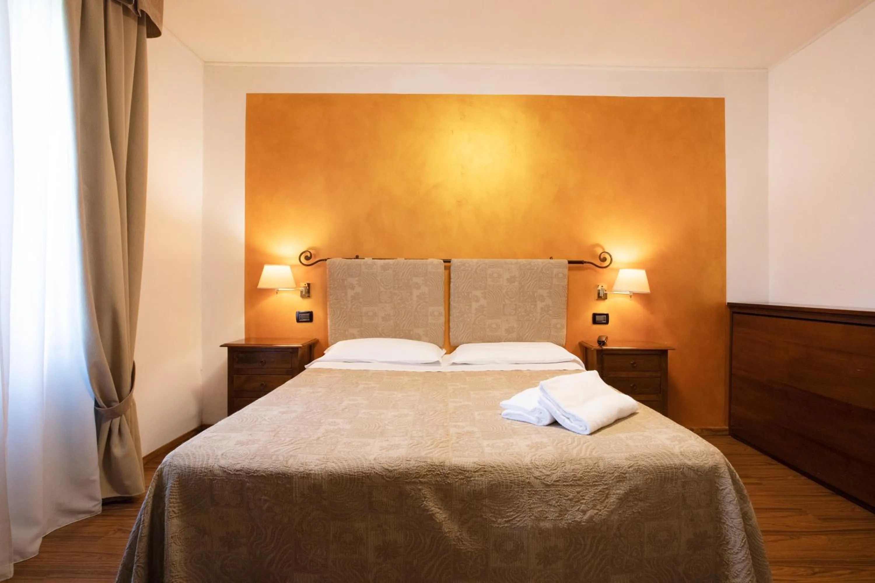 Bed in Hotel Arcobaleno Siena