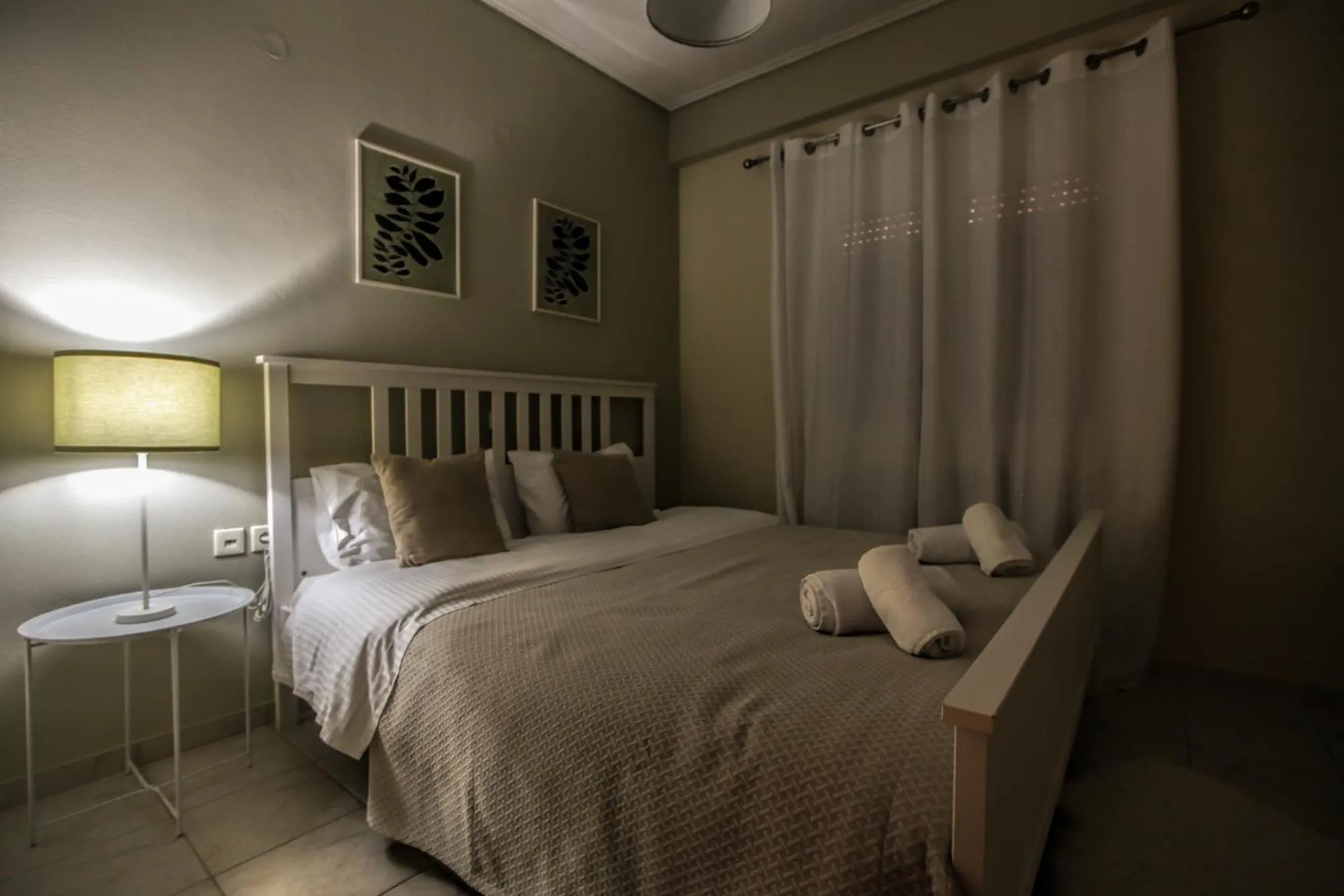 Bed in Grand Meteora Central Luxury Apartment