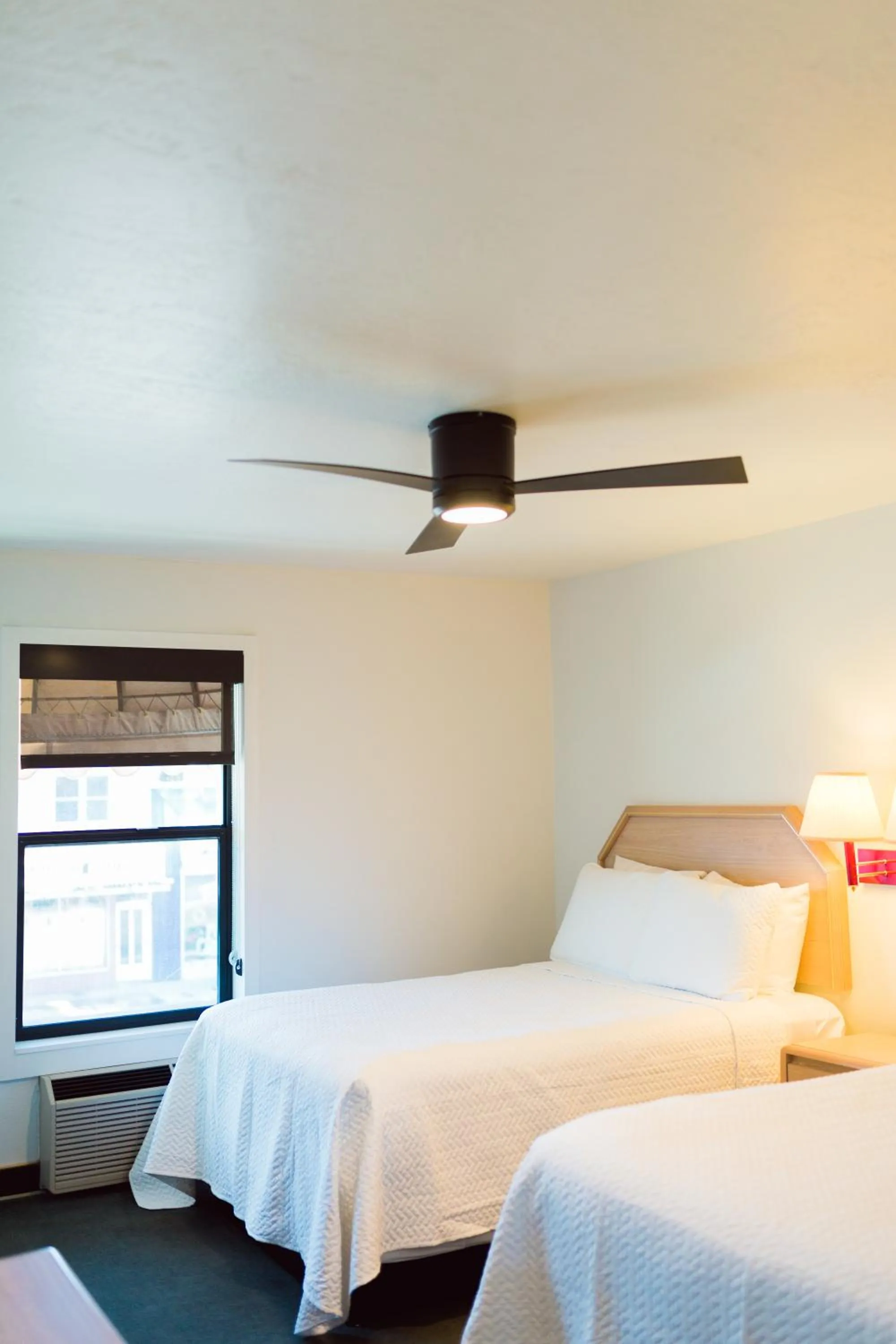 Bed in Two Sunsets Hotel