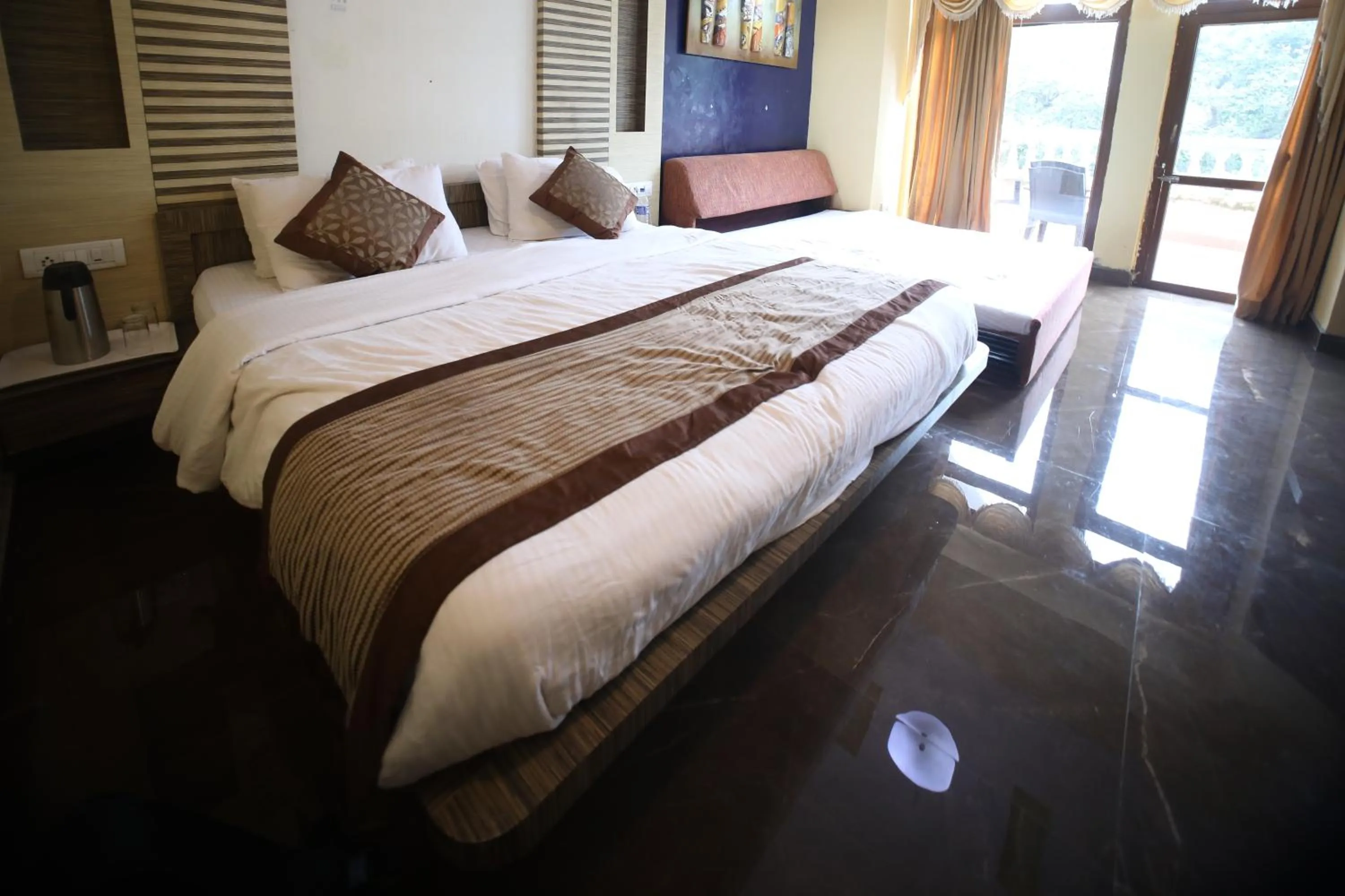 Bed in The Byke Heritage Resort - Matheran