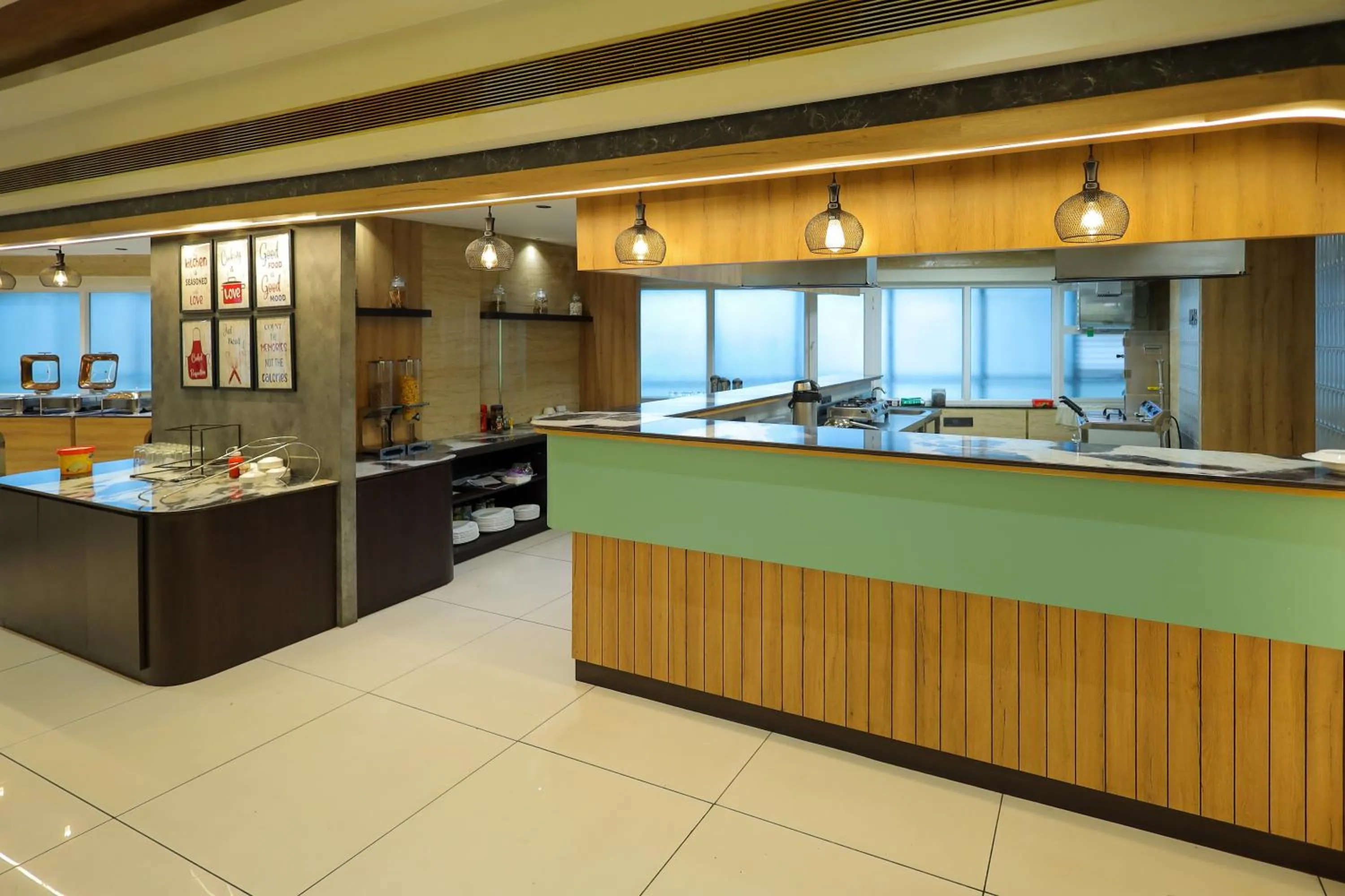 kitchen in Royal Plaza Suites by RAK Rooms, Mangaluru