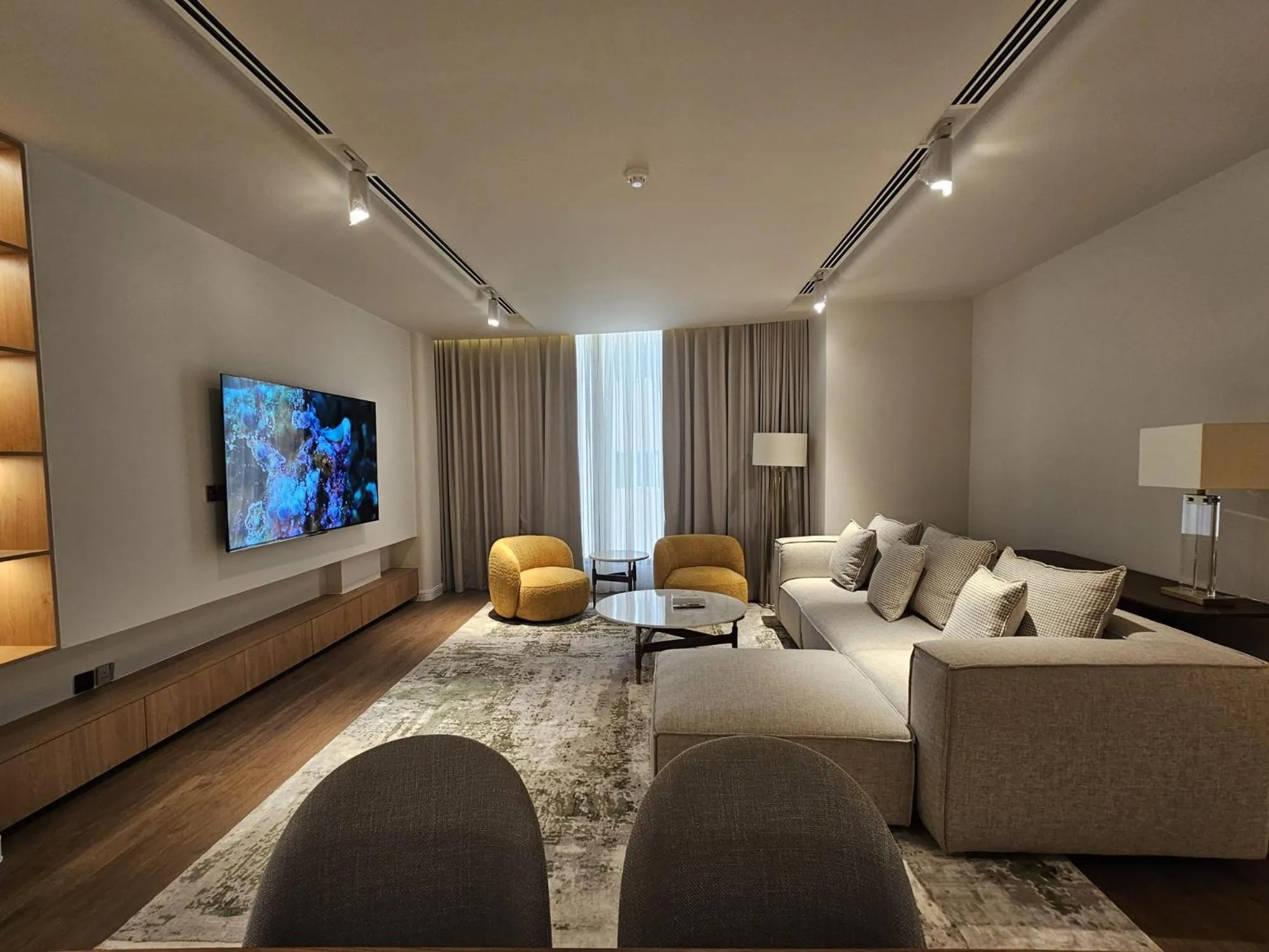 Communal lounge/ TV room in Al Faris Suites 2