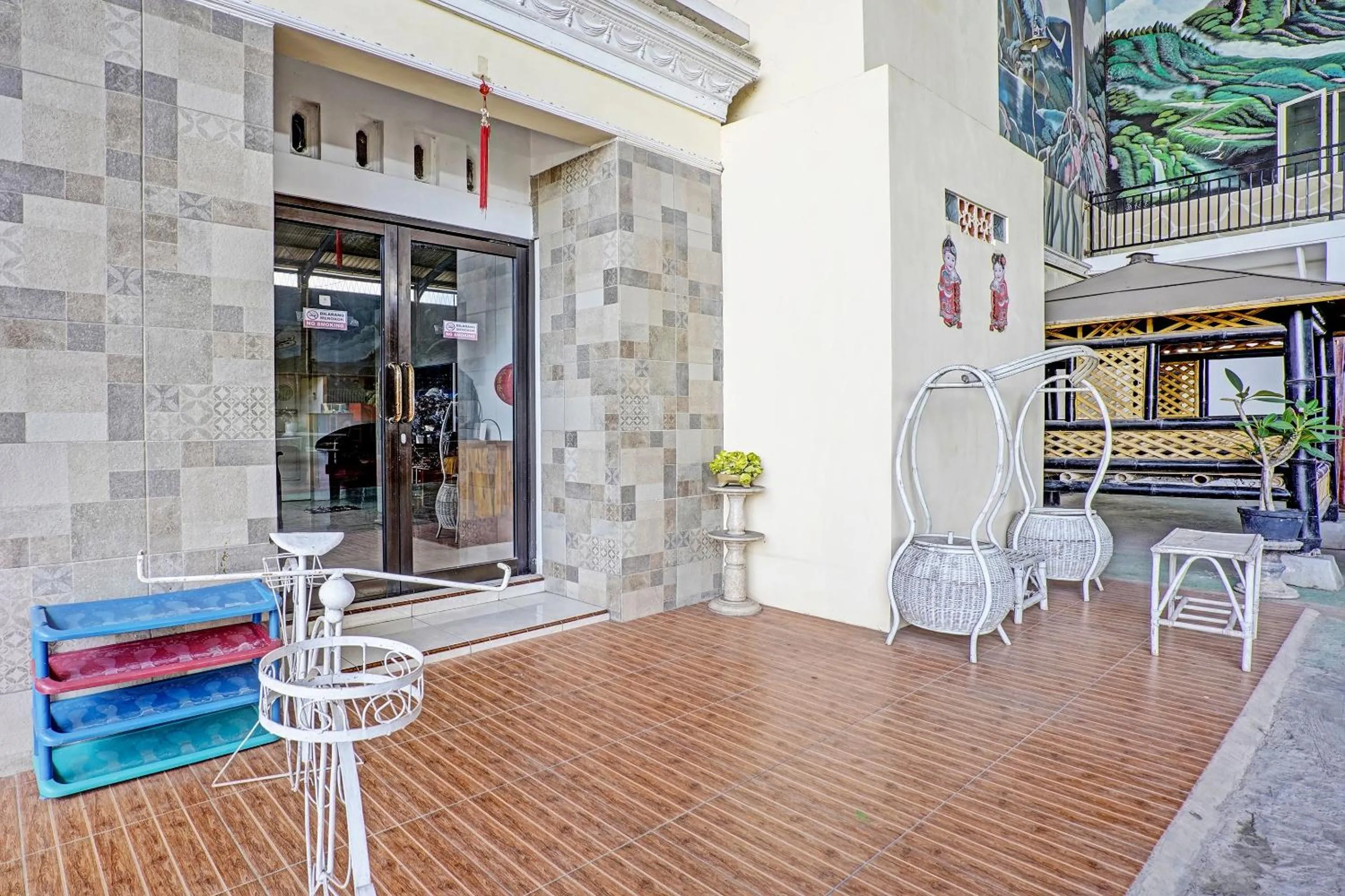 Facade/entrance in OYO 90943 Mochi 88 Homestay