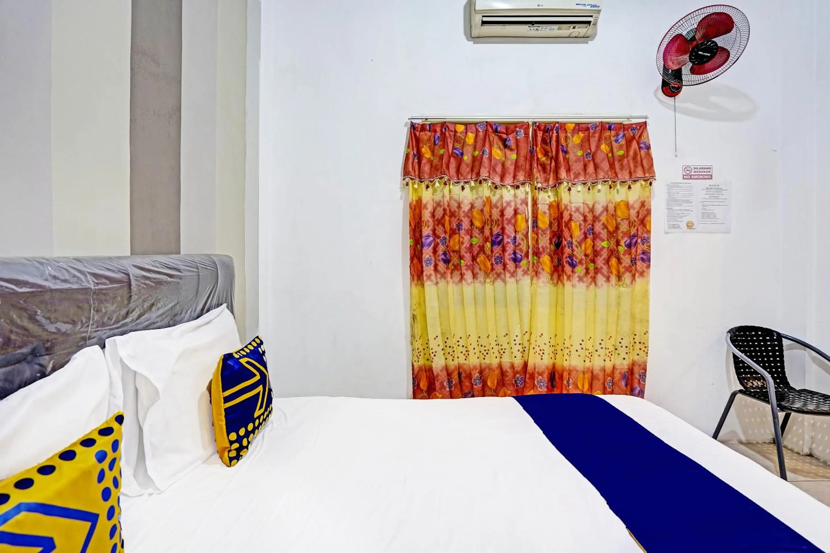 Bedroom in OYO 90943 Mochi 88 Homestay