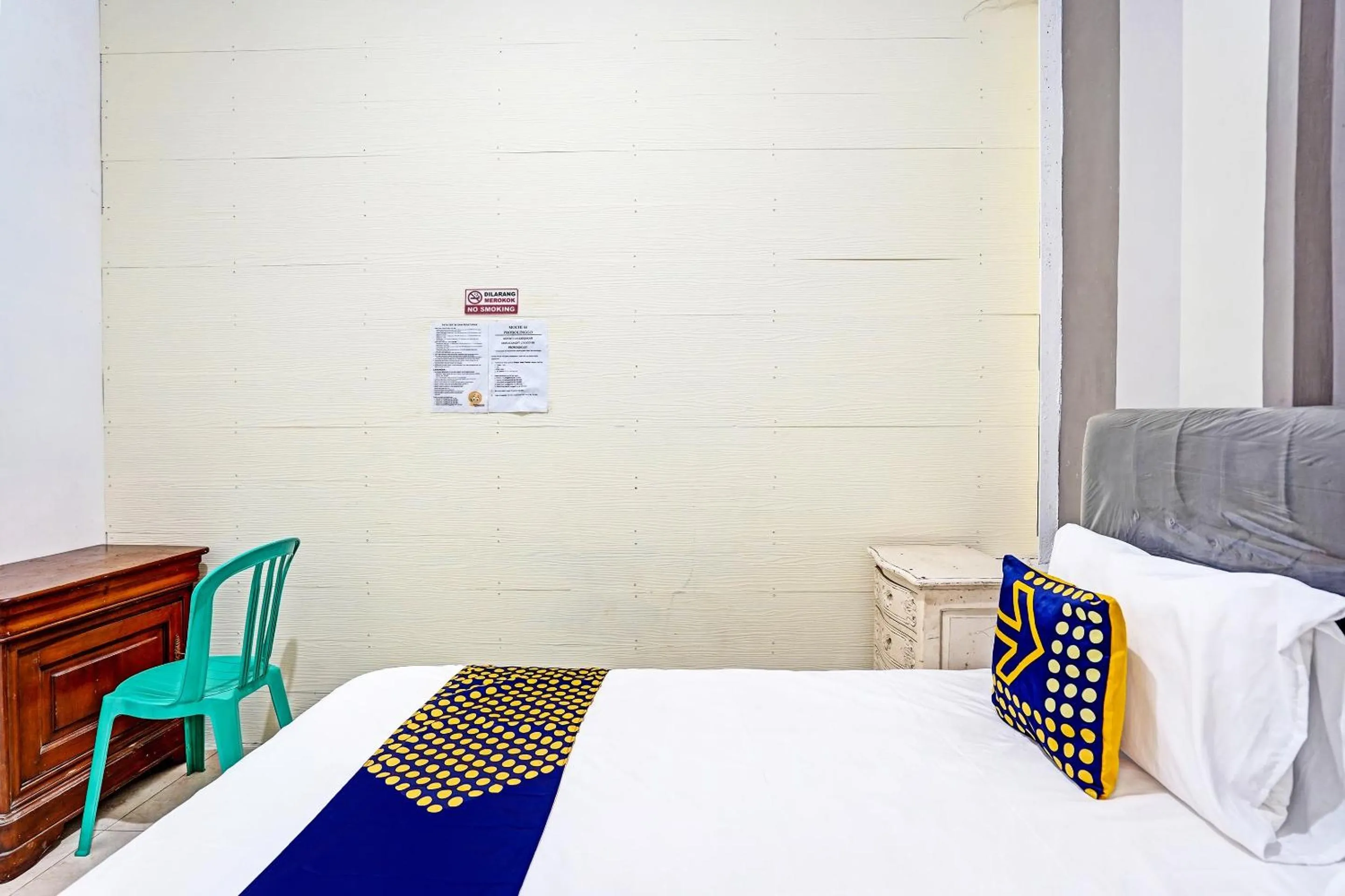 Bedroom in OYO 90943 Mochi 88 Homestay