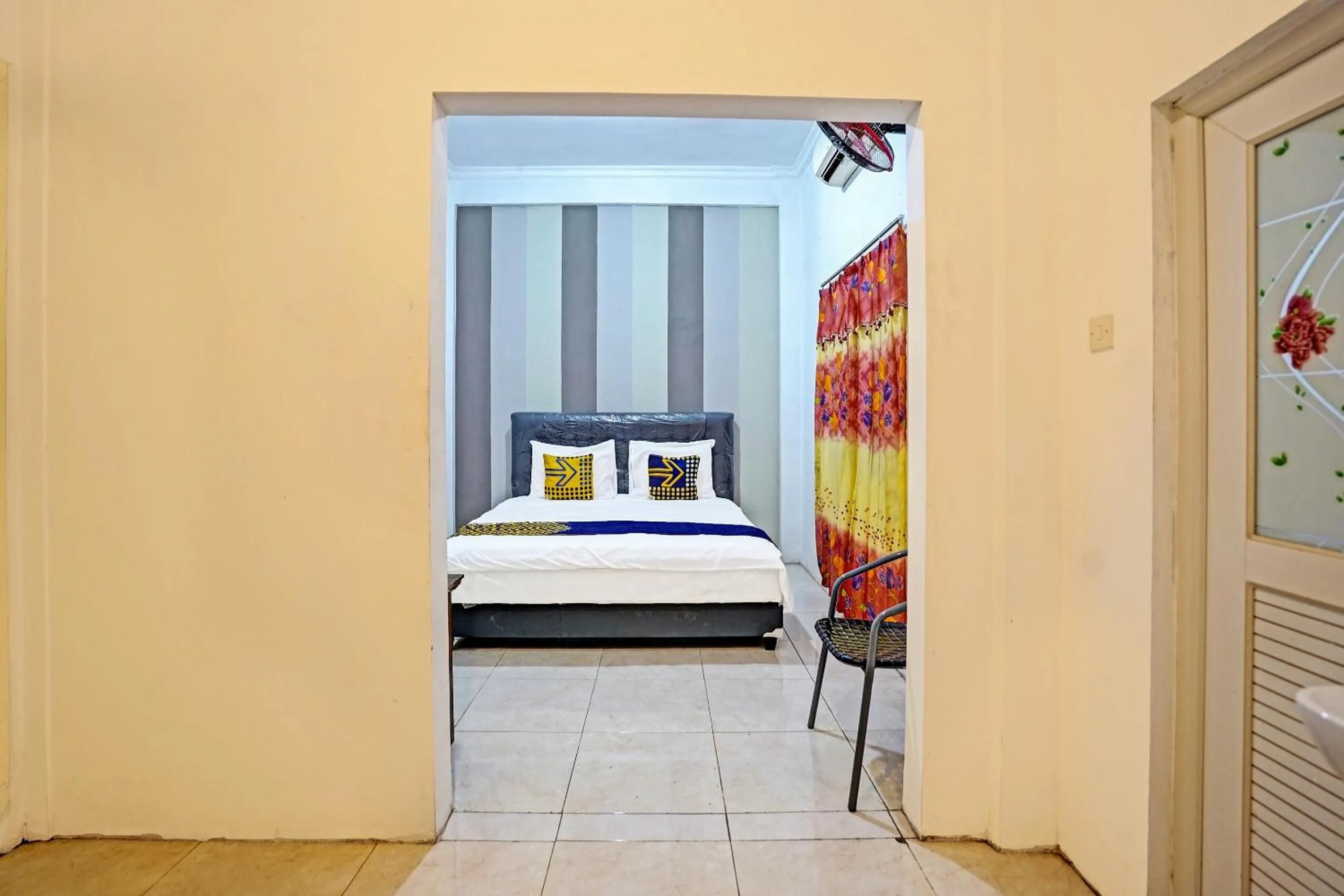 Bedroom in OYO 90943 Mochi 88 Homestay