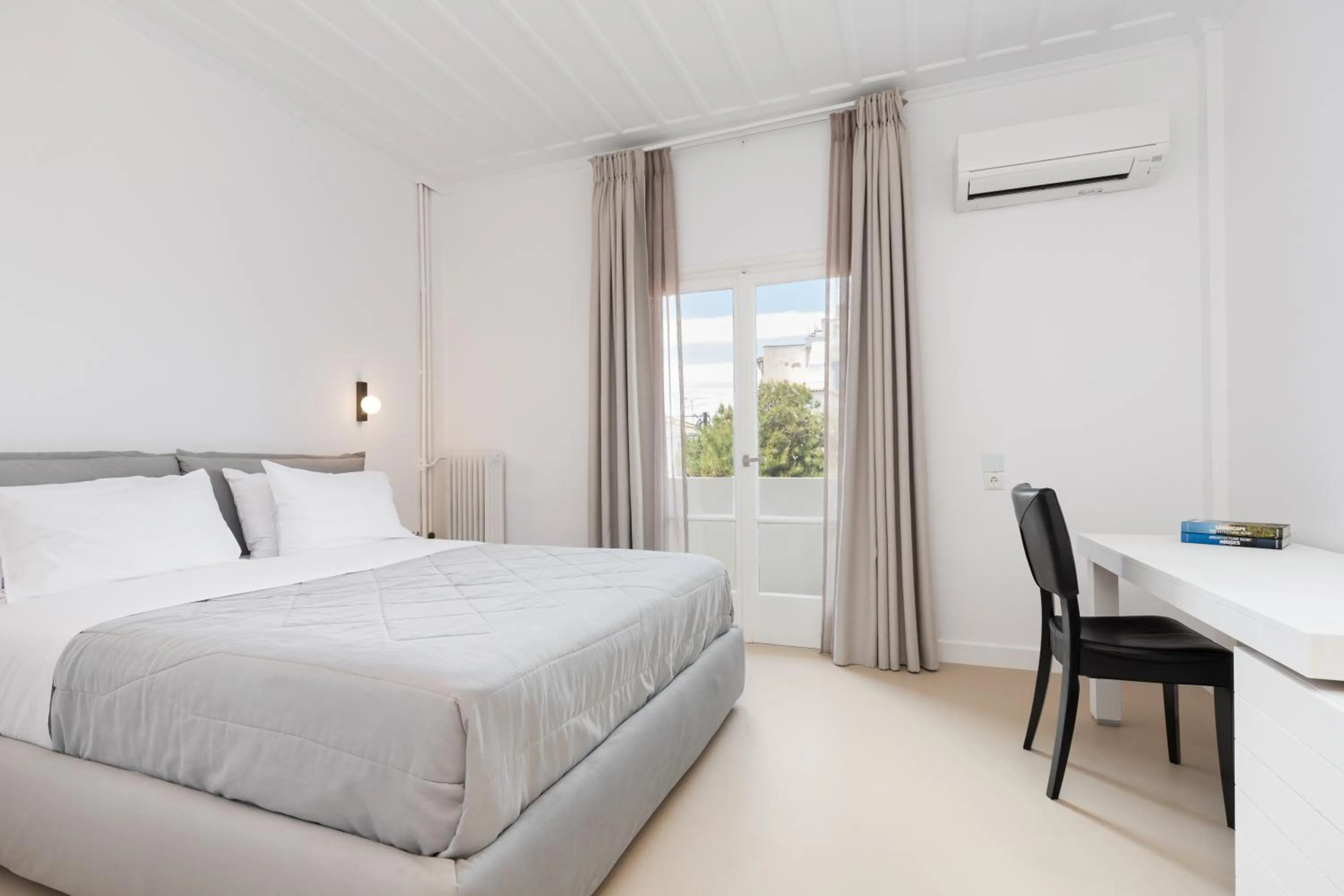 Bed in Hotel Roumani