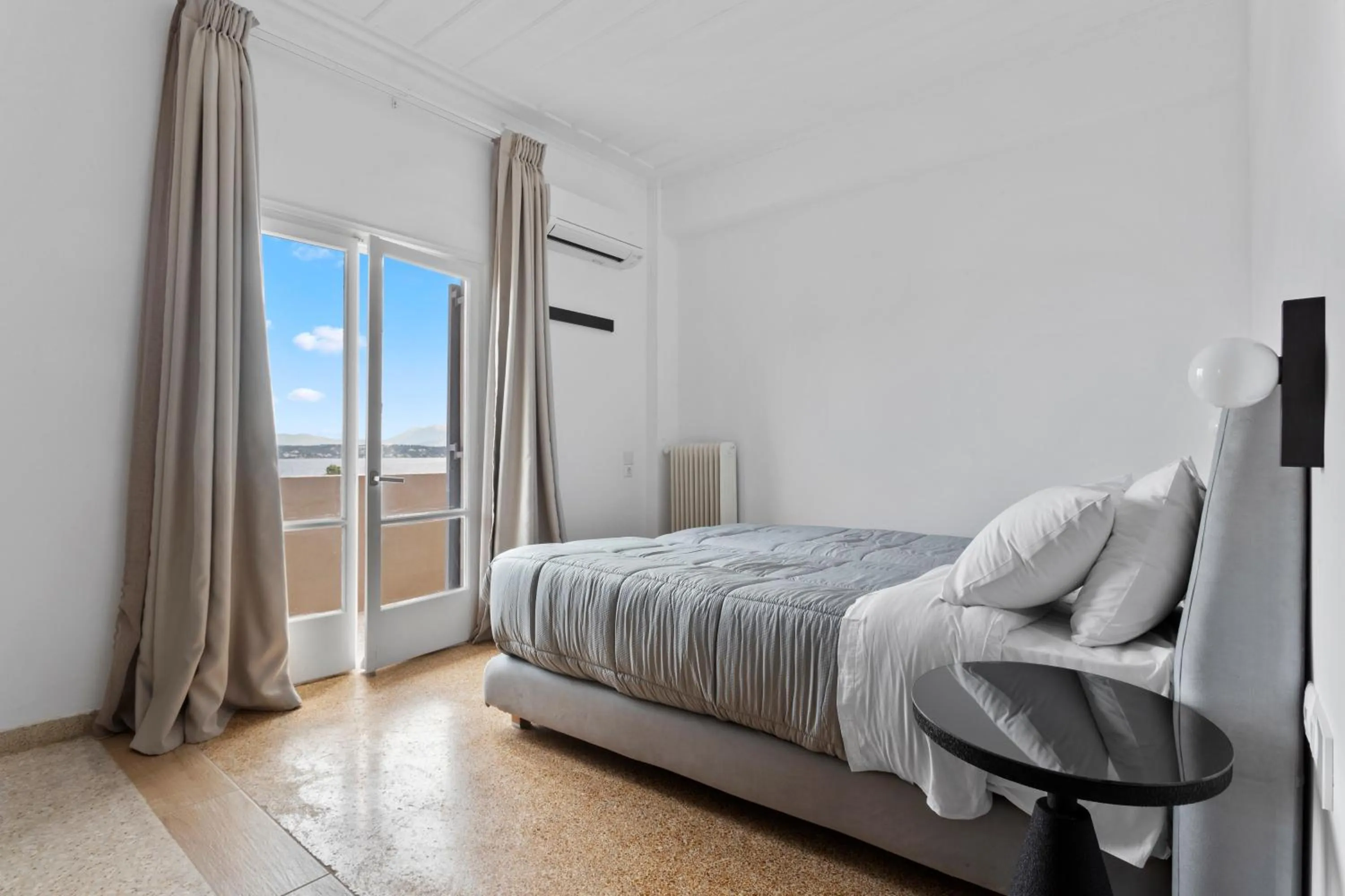 Bed in Hotel Roumani