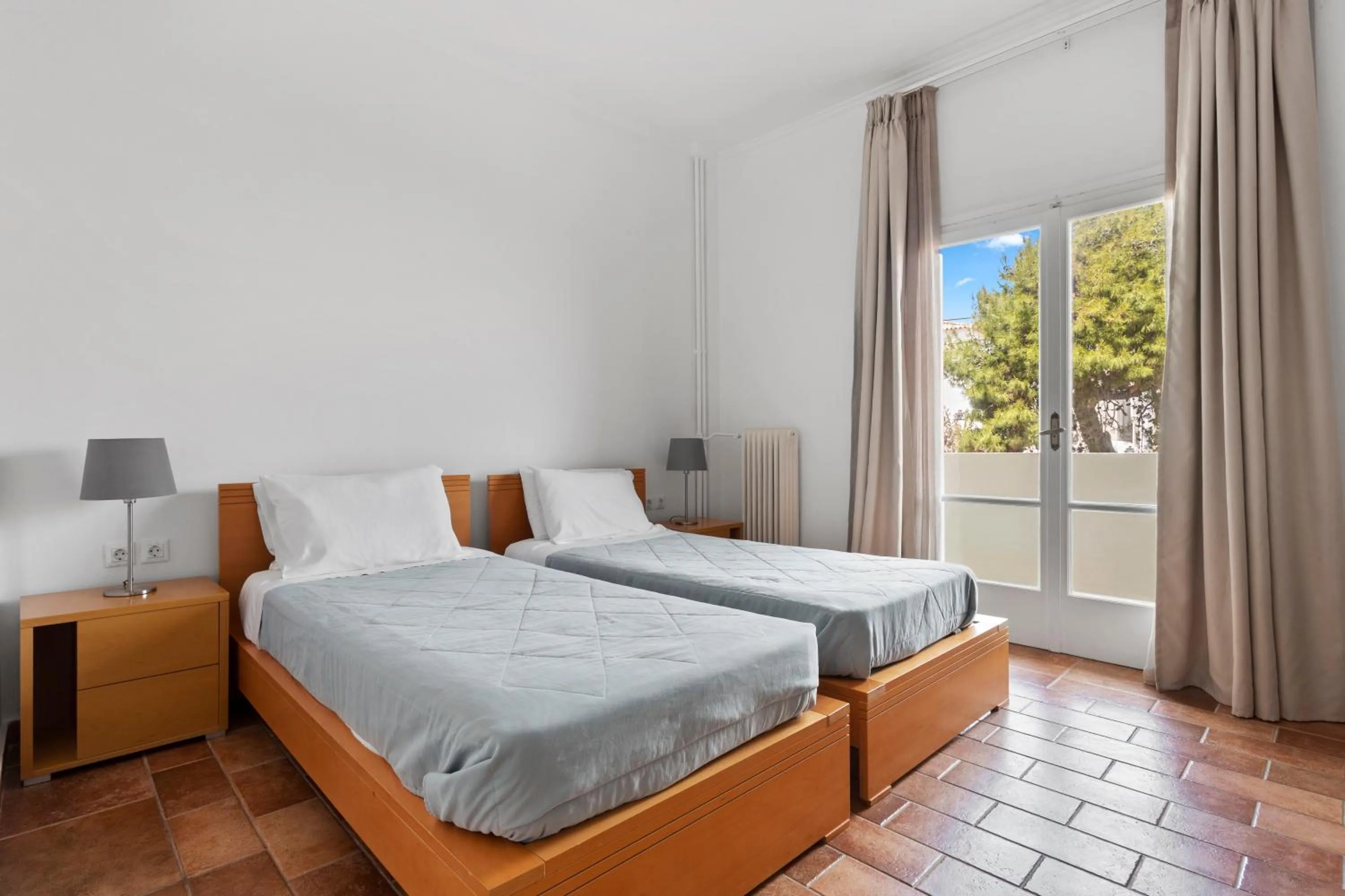 Bed in Hotel Roumani