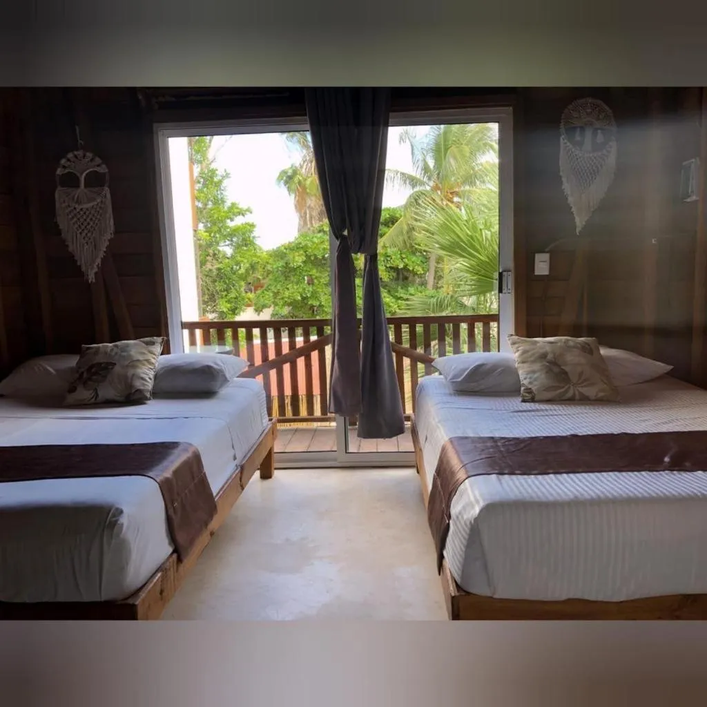 Bed in Cabañas Chac Mool Downtown