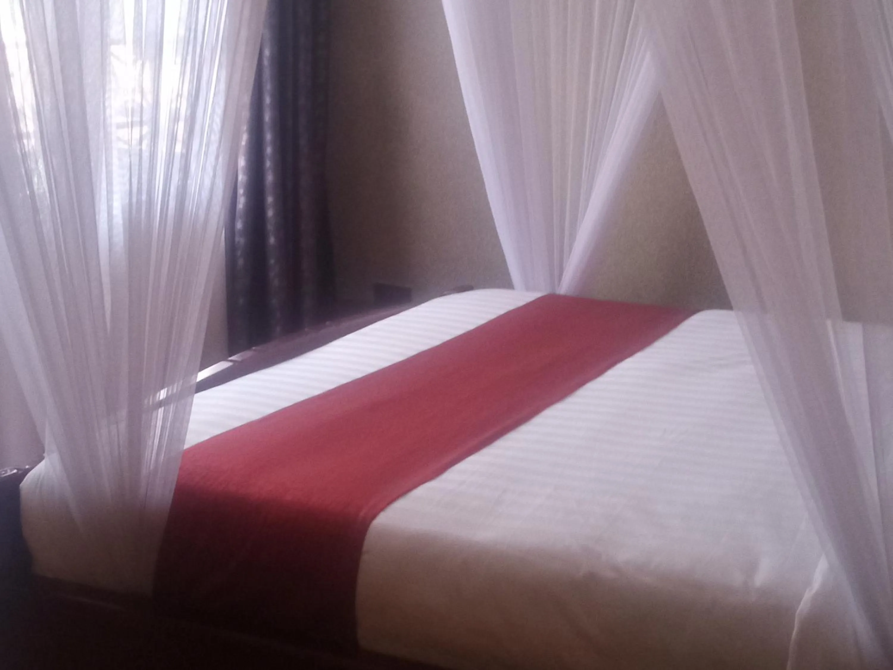 Bed in Mlex Hotel