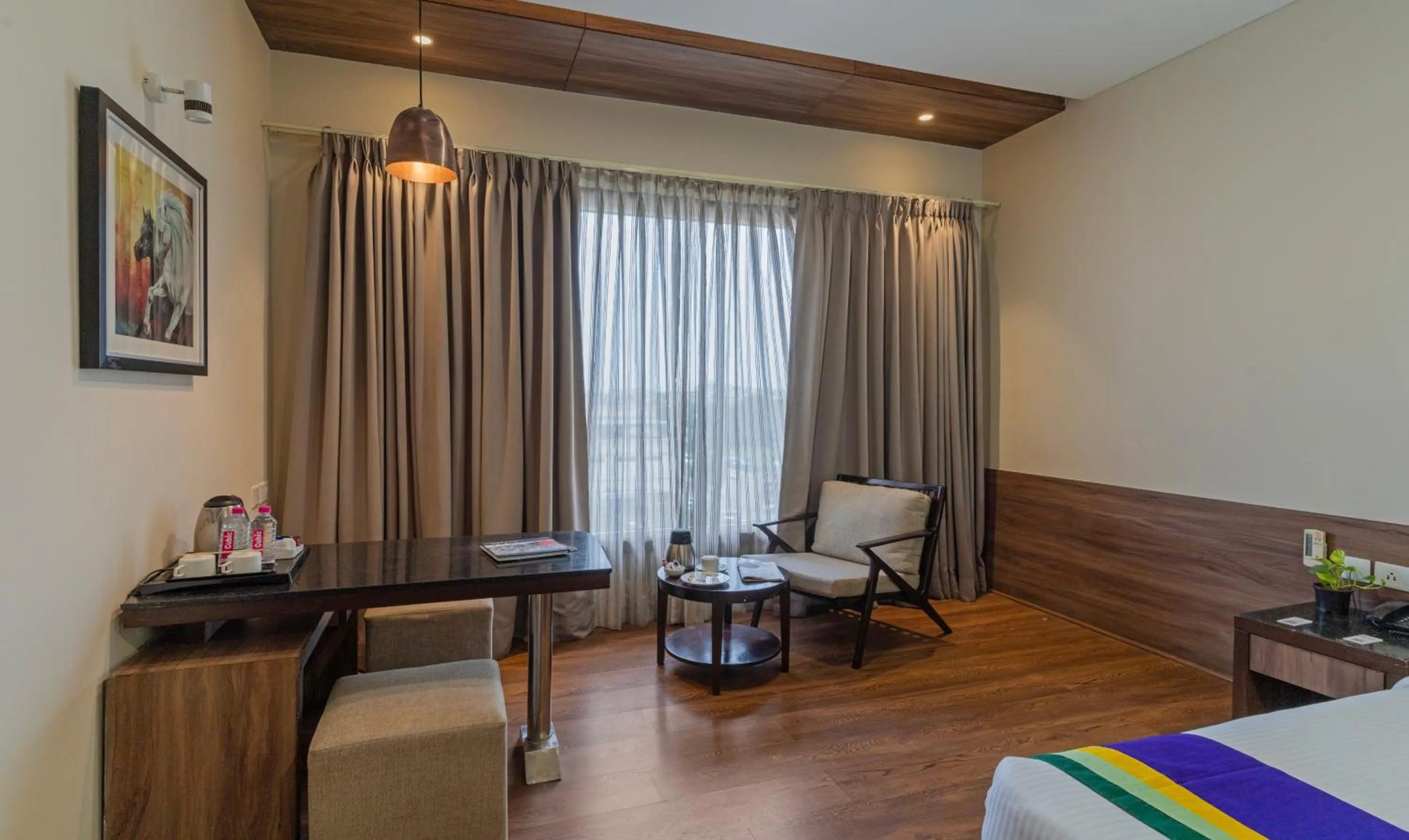 Seating area in Treebo Premium Baramasi By Jai Club Prime