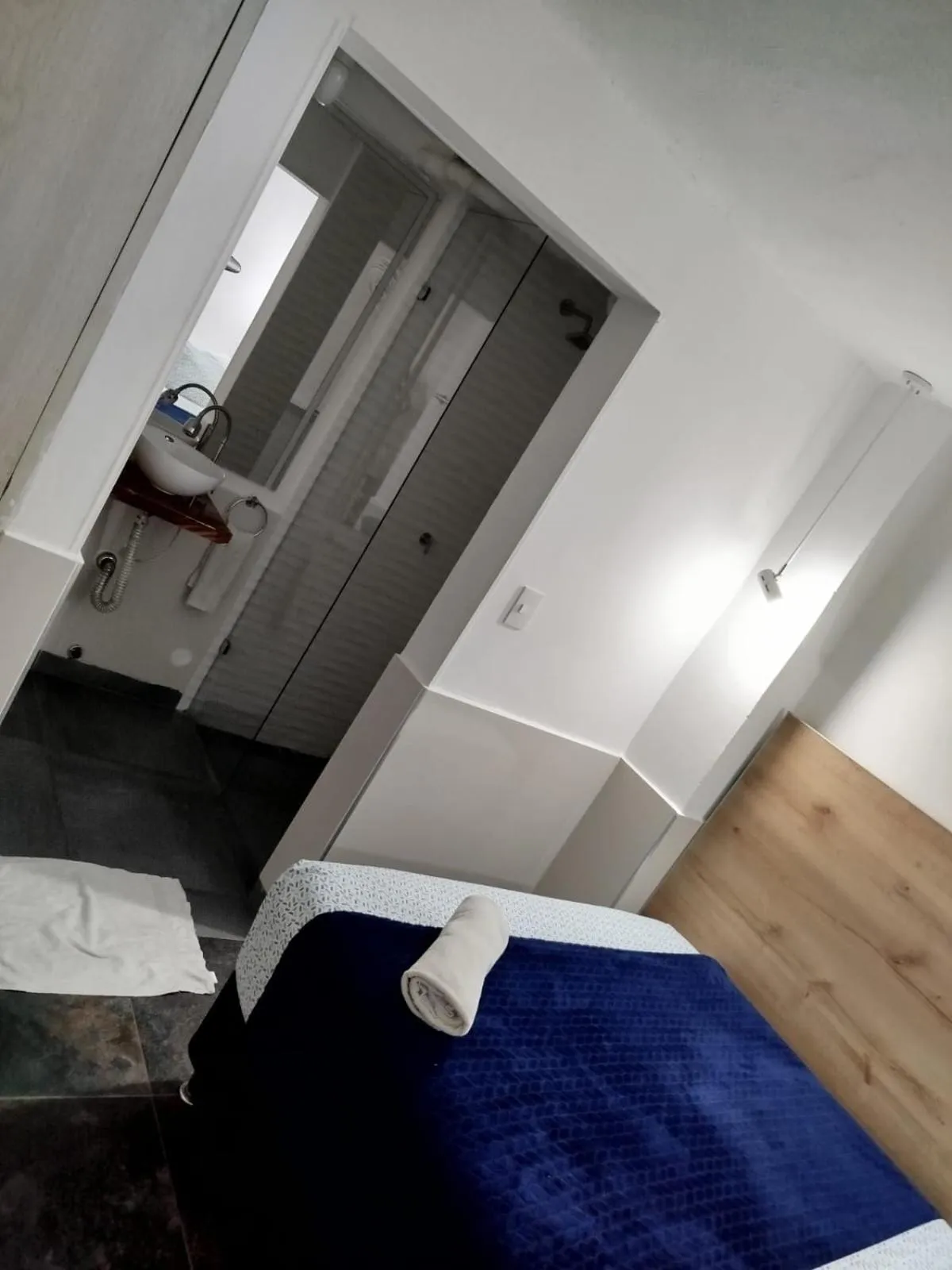 Photo of the whole room, Bed in Comunidad Calle 13 Hotel Boutique