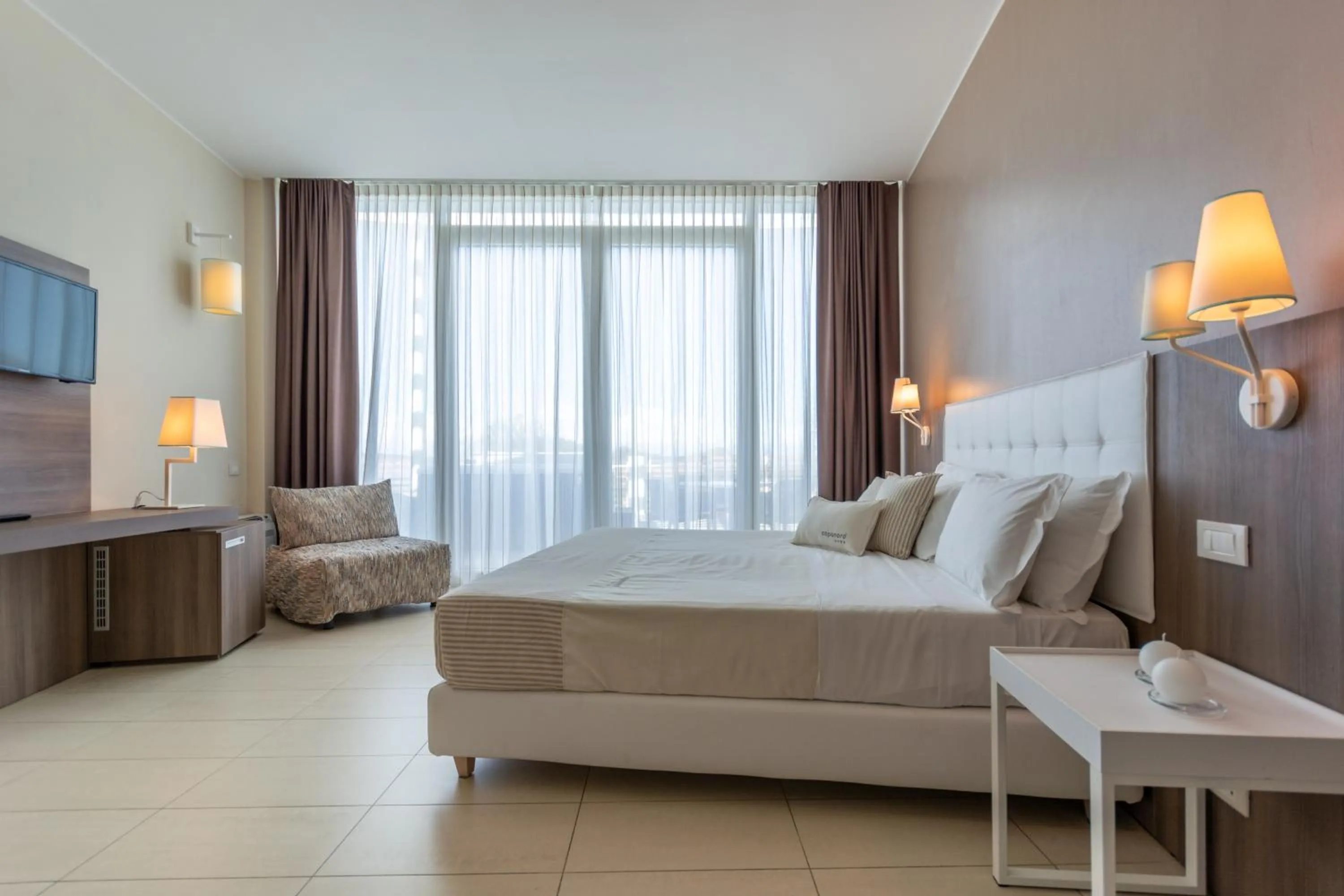 Photo of the whole room, Bed in Isola di Albarella Hotel Capo Nord