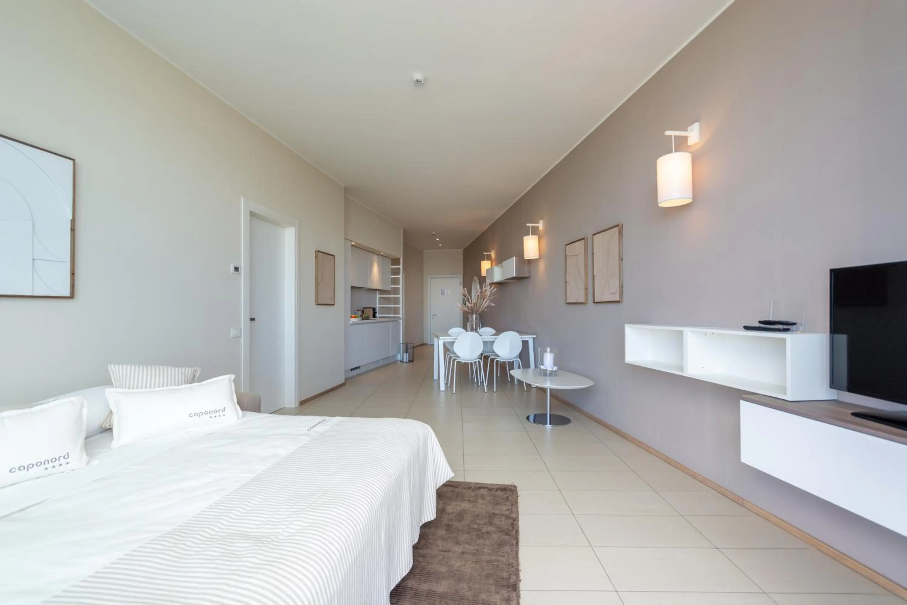 Kitchen or kitchenette, Bed in Isola di Albarella Hotel Capo Nord