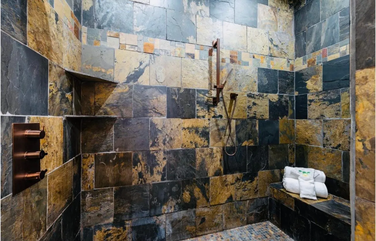 Shower in Knotty and Nice Luxury Cabin