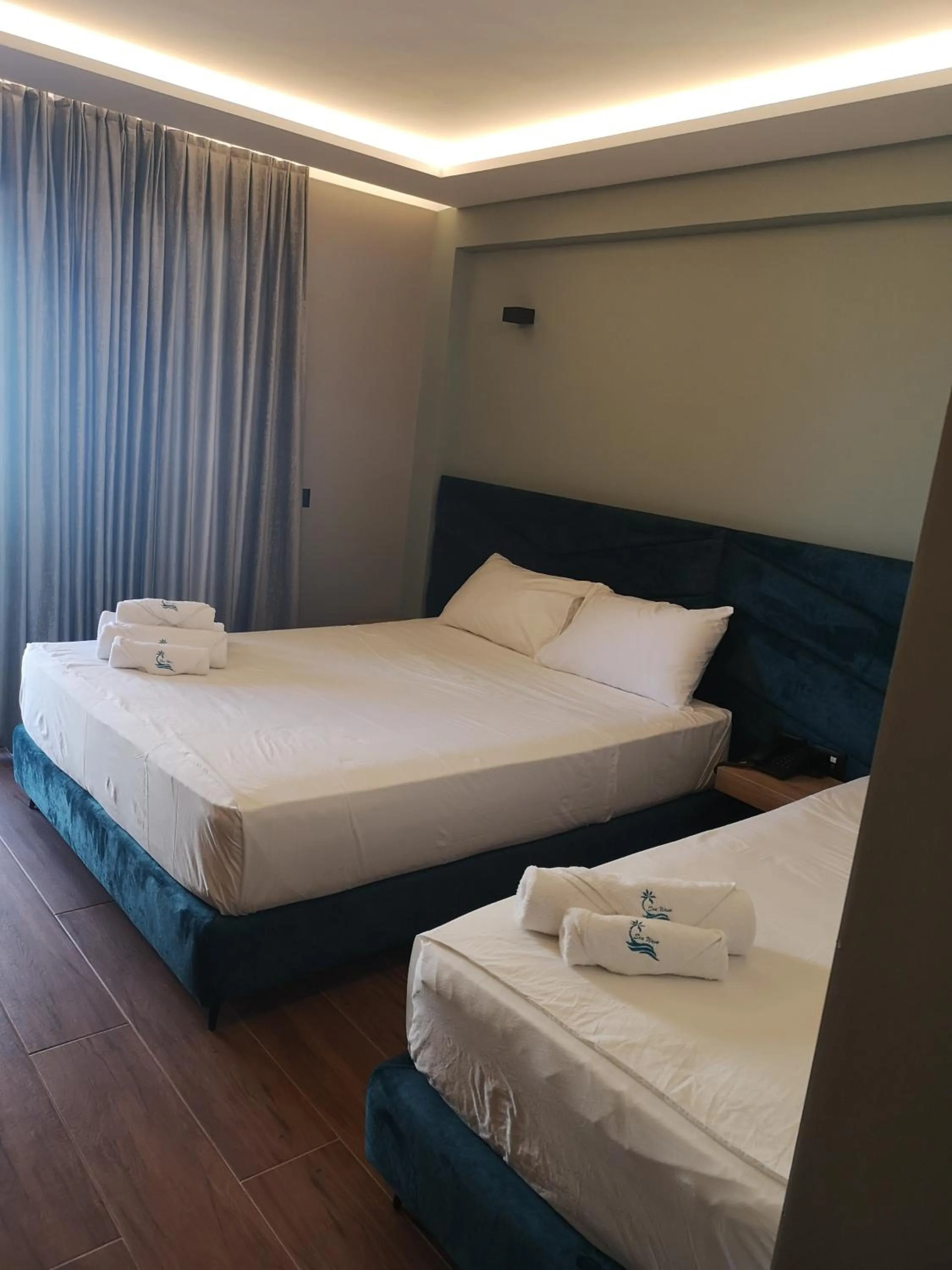 Bed in Seawave Hotel