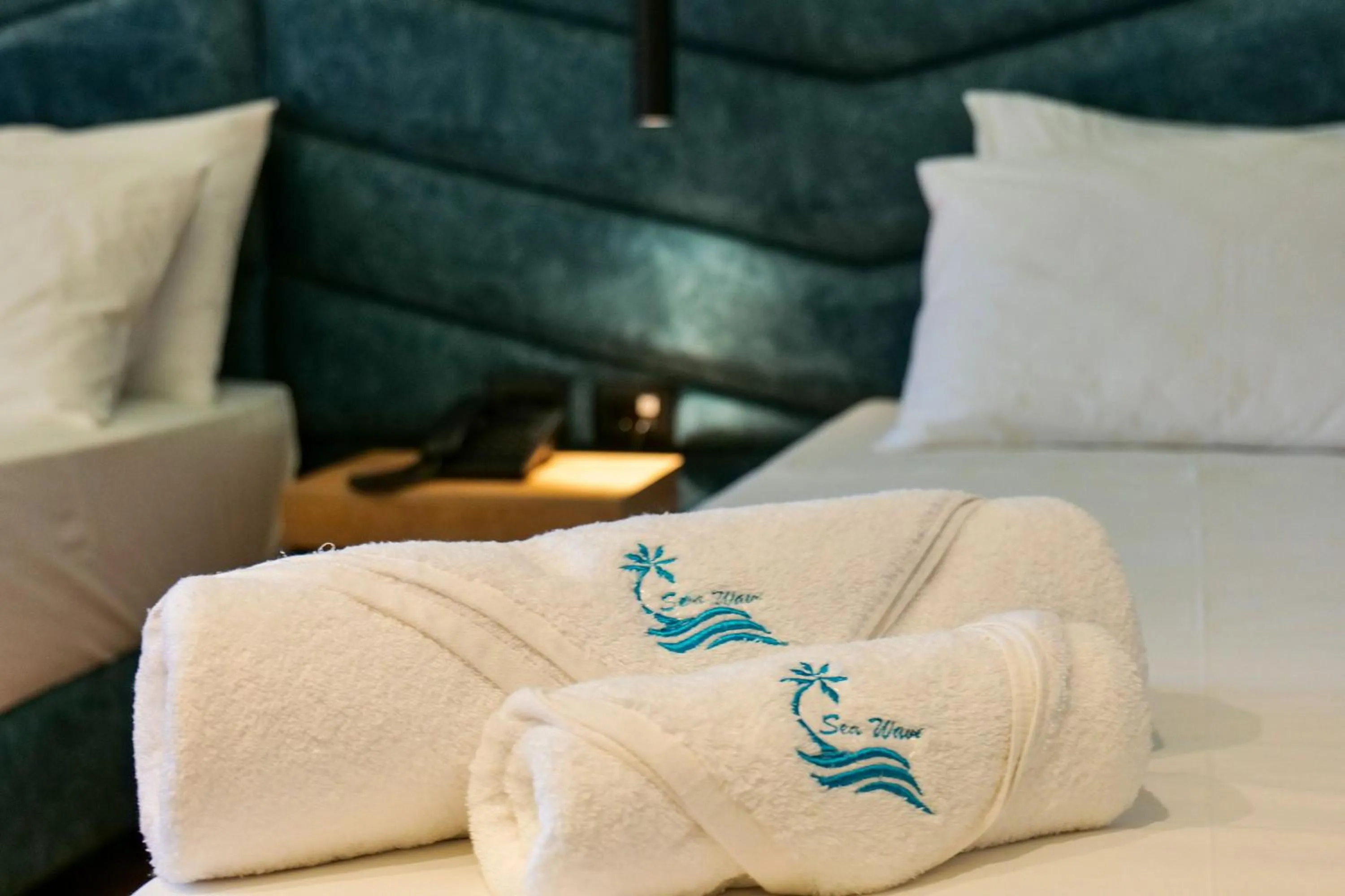 Bed in Seawave Hotel