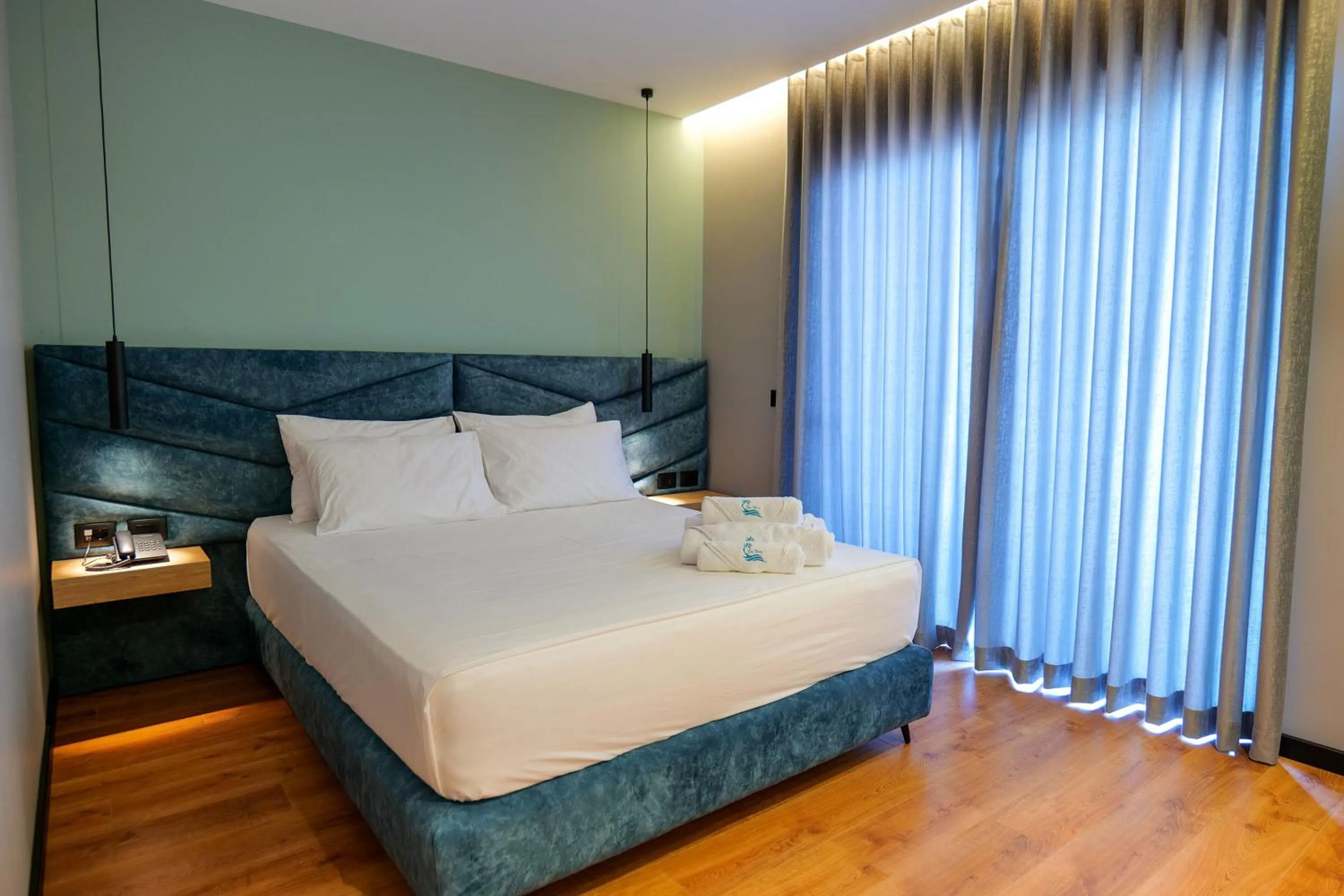 Bed in Seawave Hotel