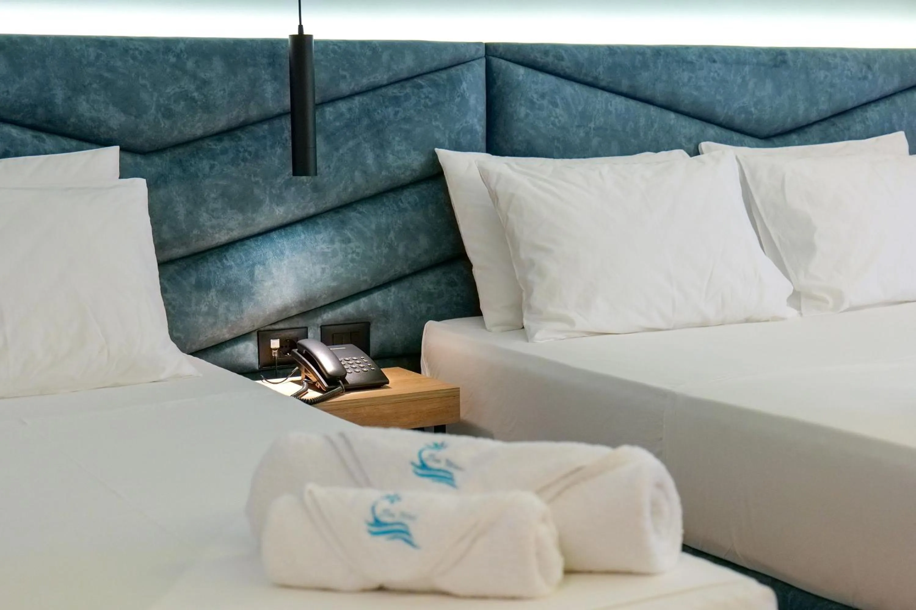 Bed in Seawave Hotel