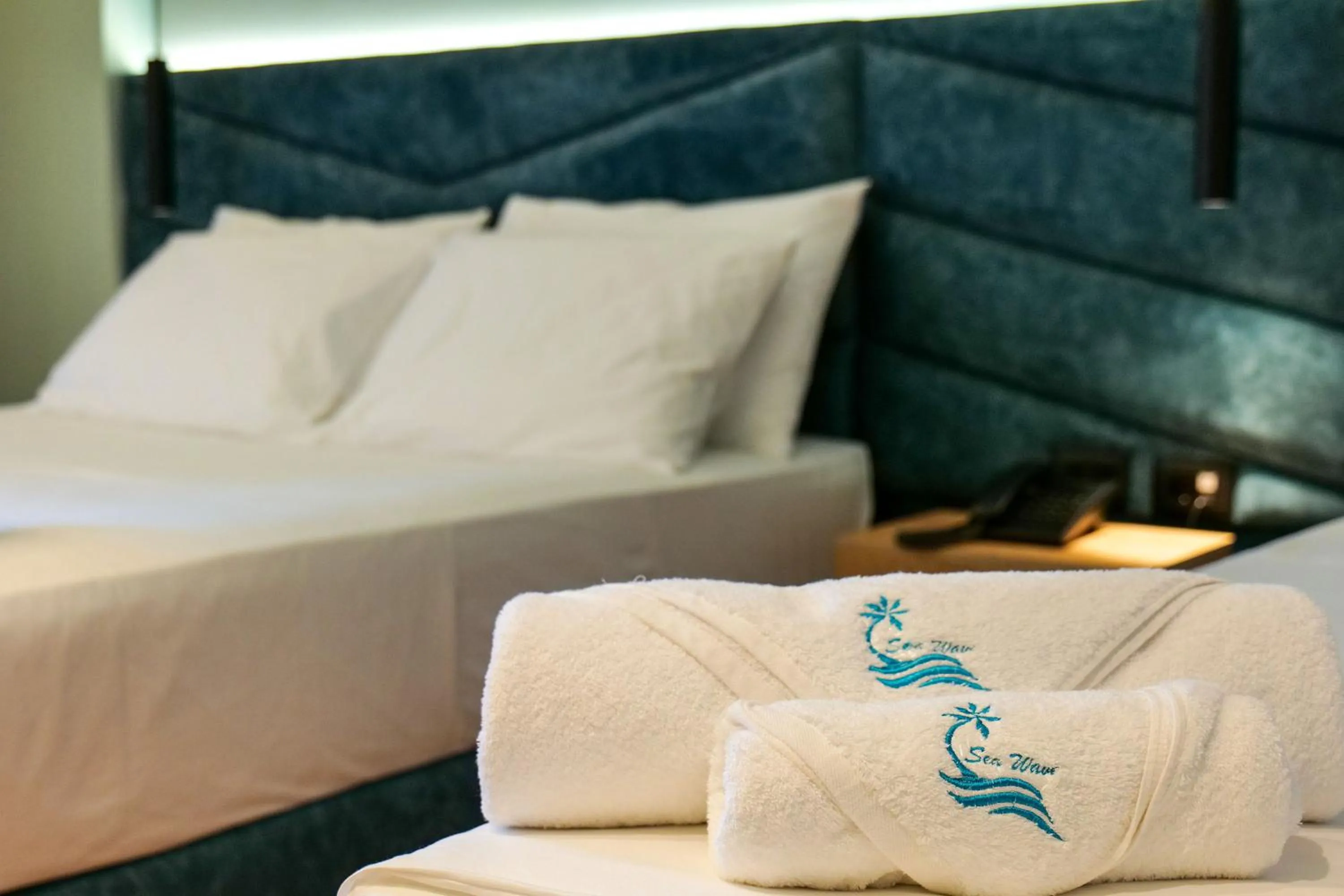 Bed in Seawave Hotel