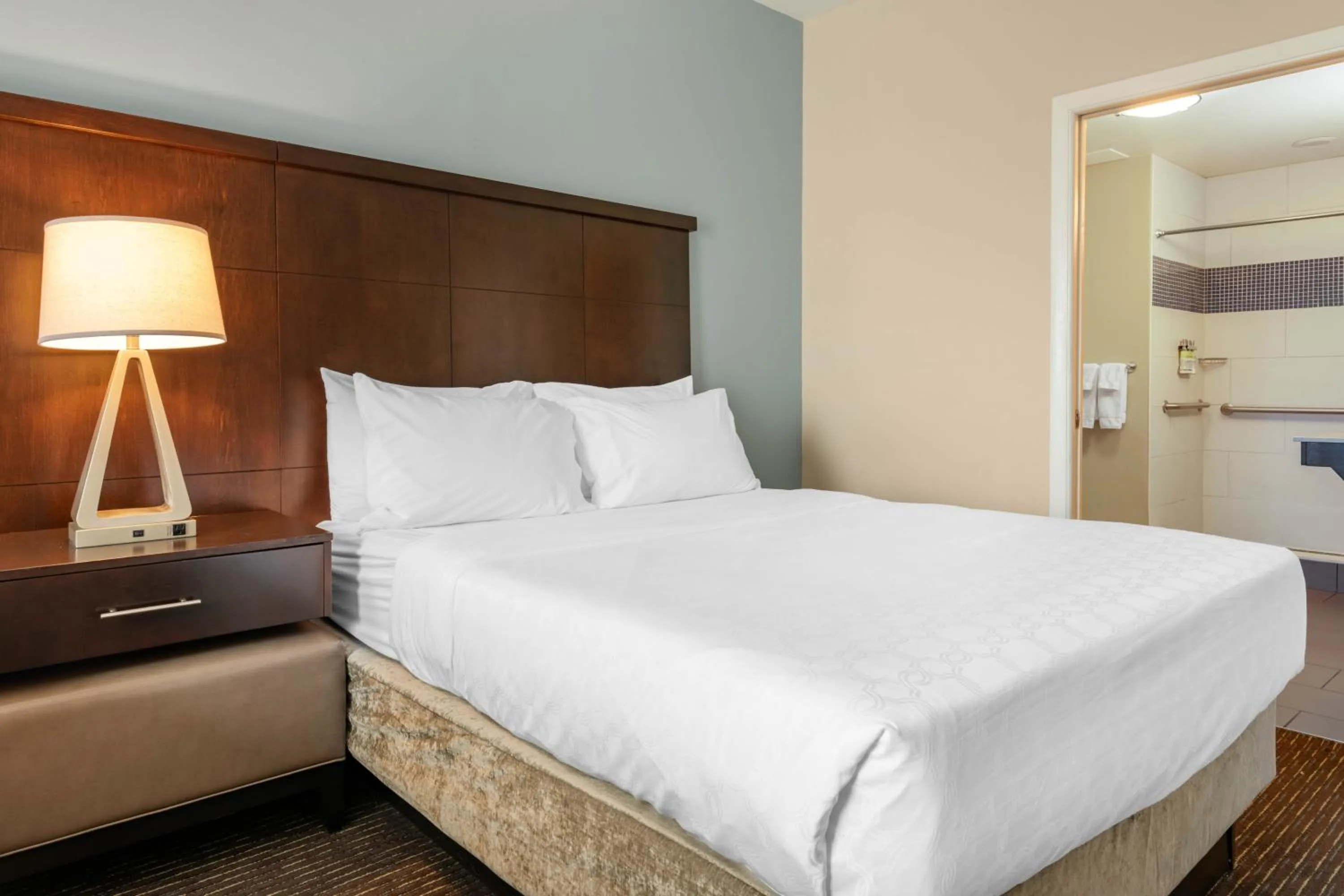 Bathroom, Bed in Staybridge Suites St. Petersburg FL by IHG