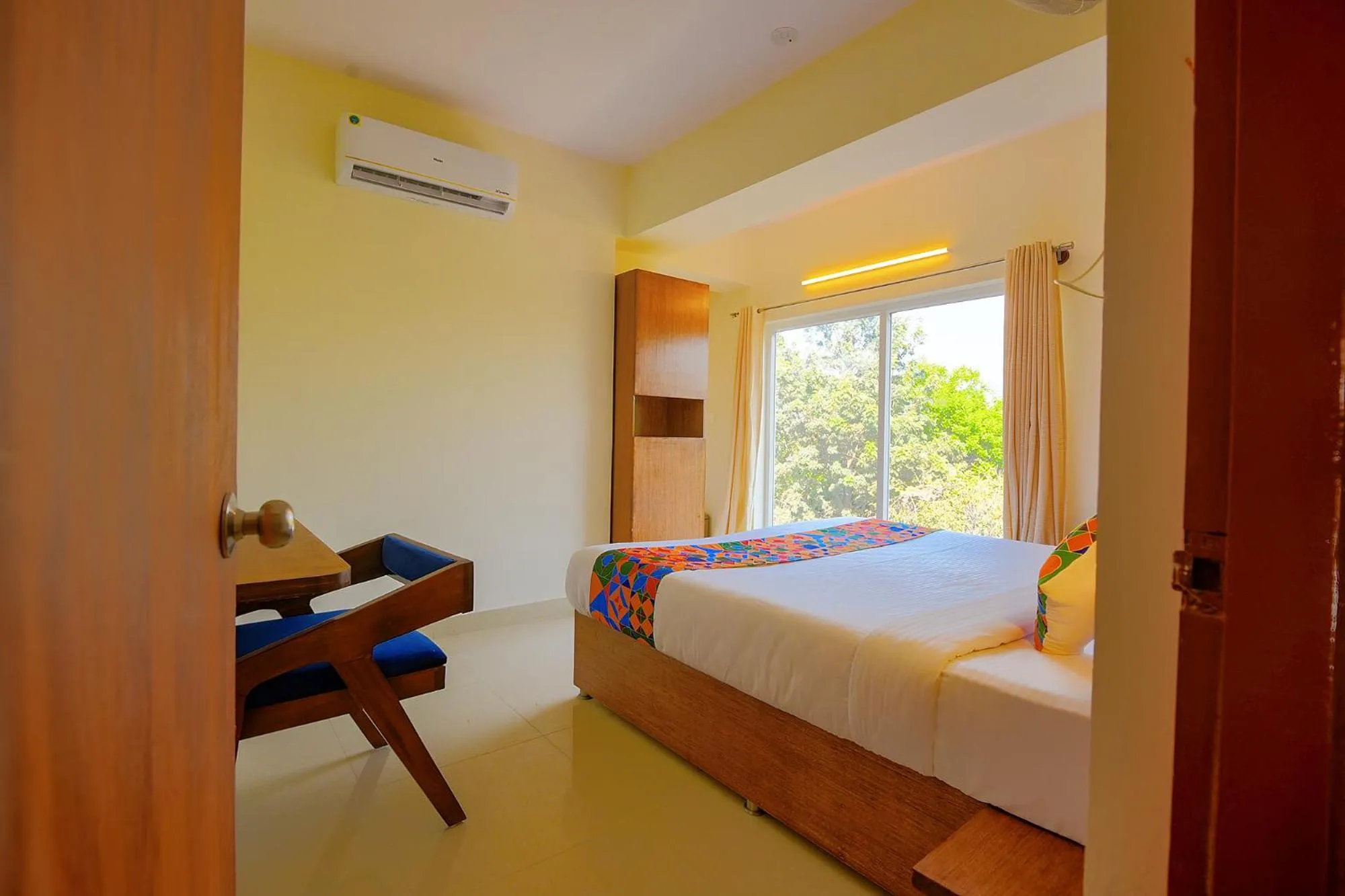 Photo of the whole room, Bed in FabHotel GR Lake View - BTM Layout