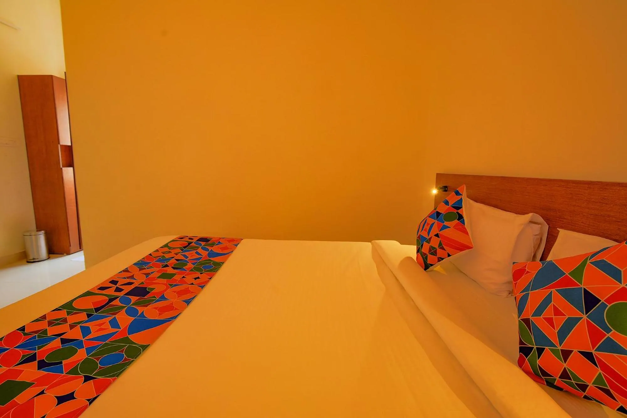 Photo of the whole room, Bed in FabHotel GR Lake View - BTM Layout