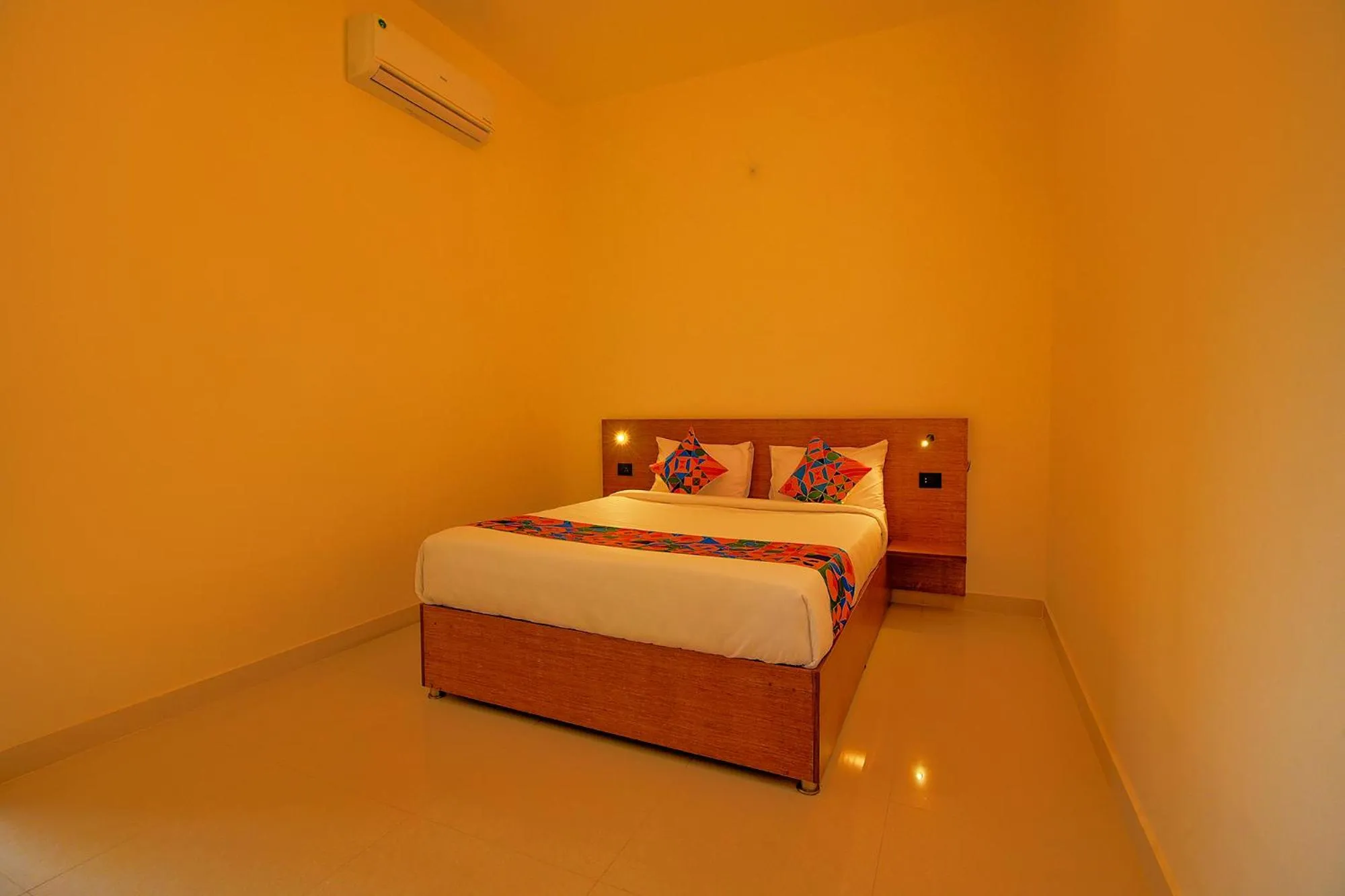 Bed in FabHotel GR Lake View - BTM Layout