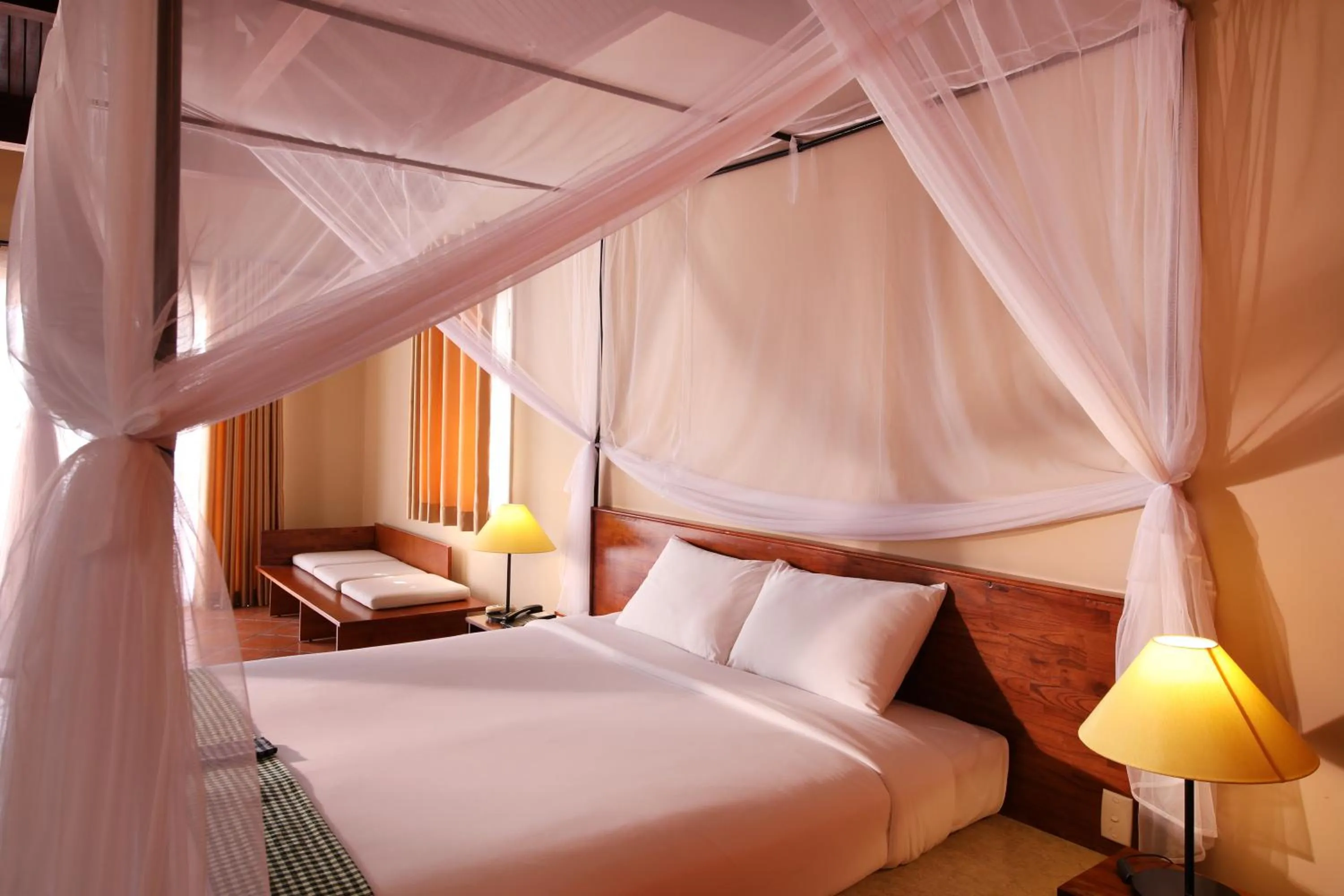 Bed in Victoria Nui Sam Lodge