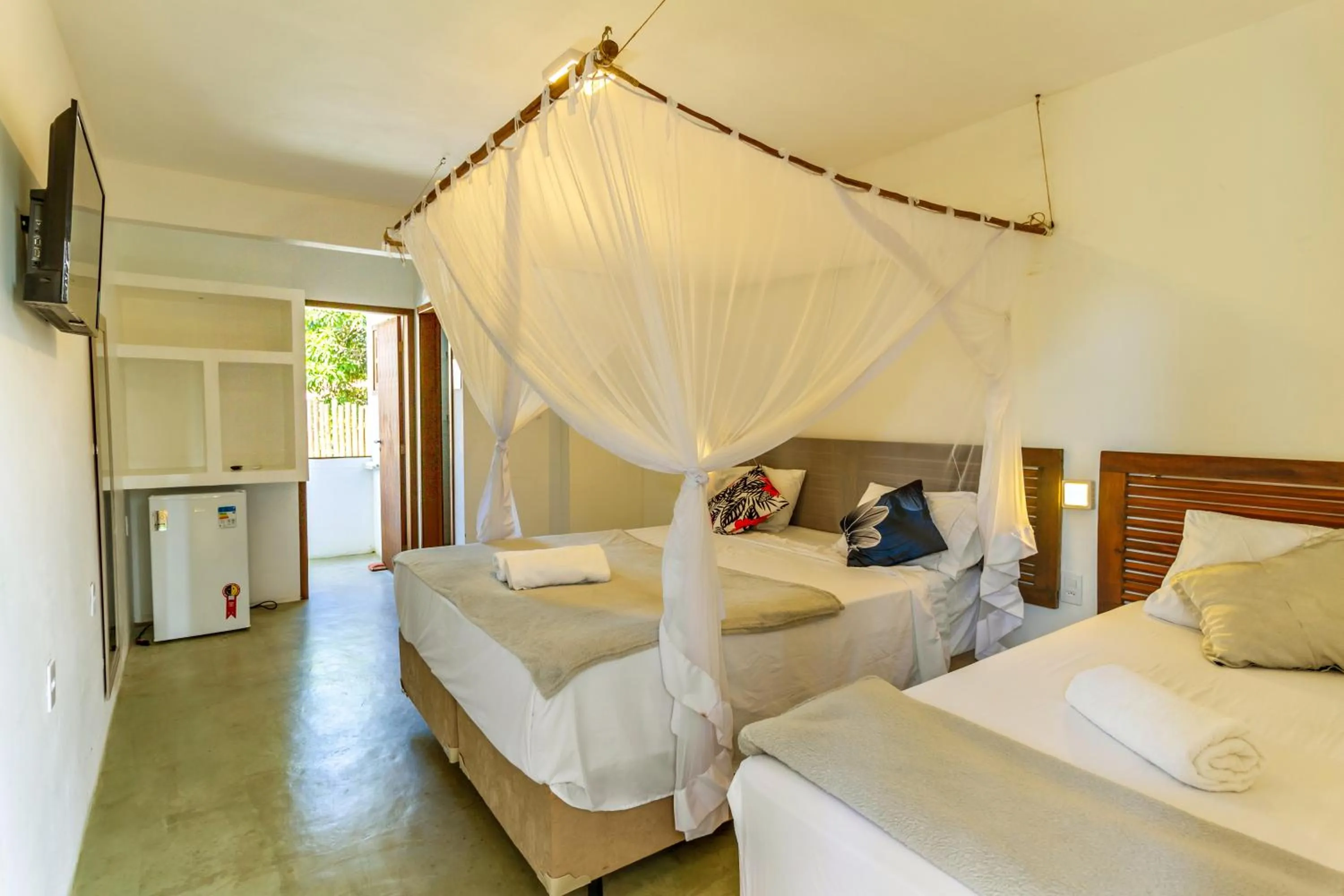 Property building, Bed in Pousada Imperador do Espelho