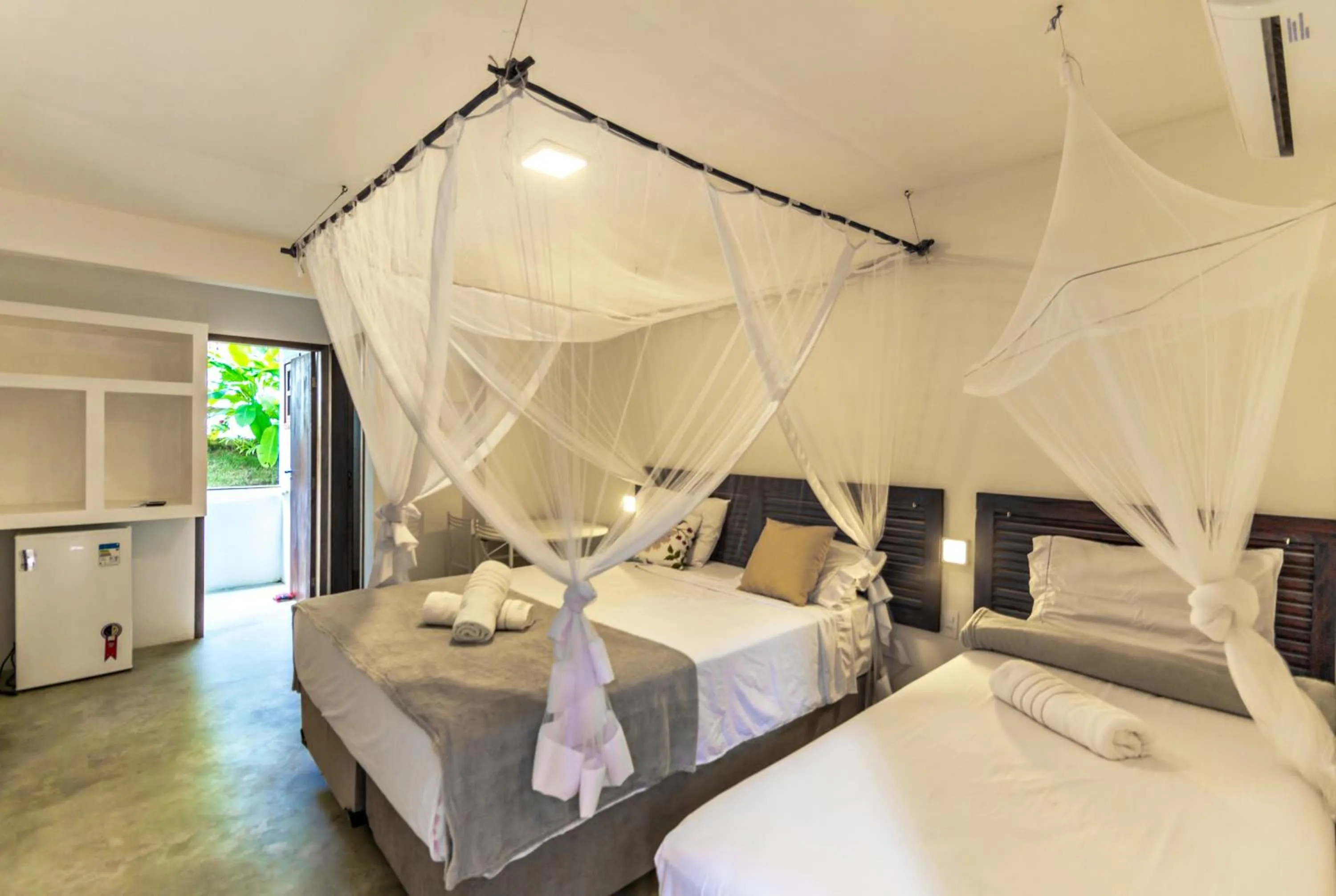 Bed in Pousada Imperador do Espelho