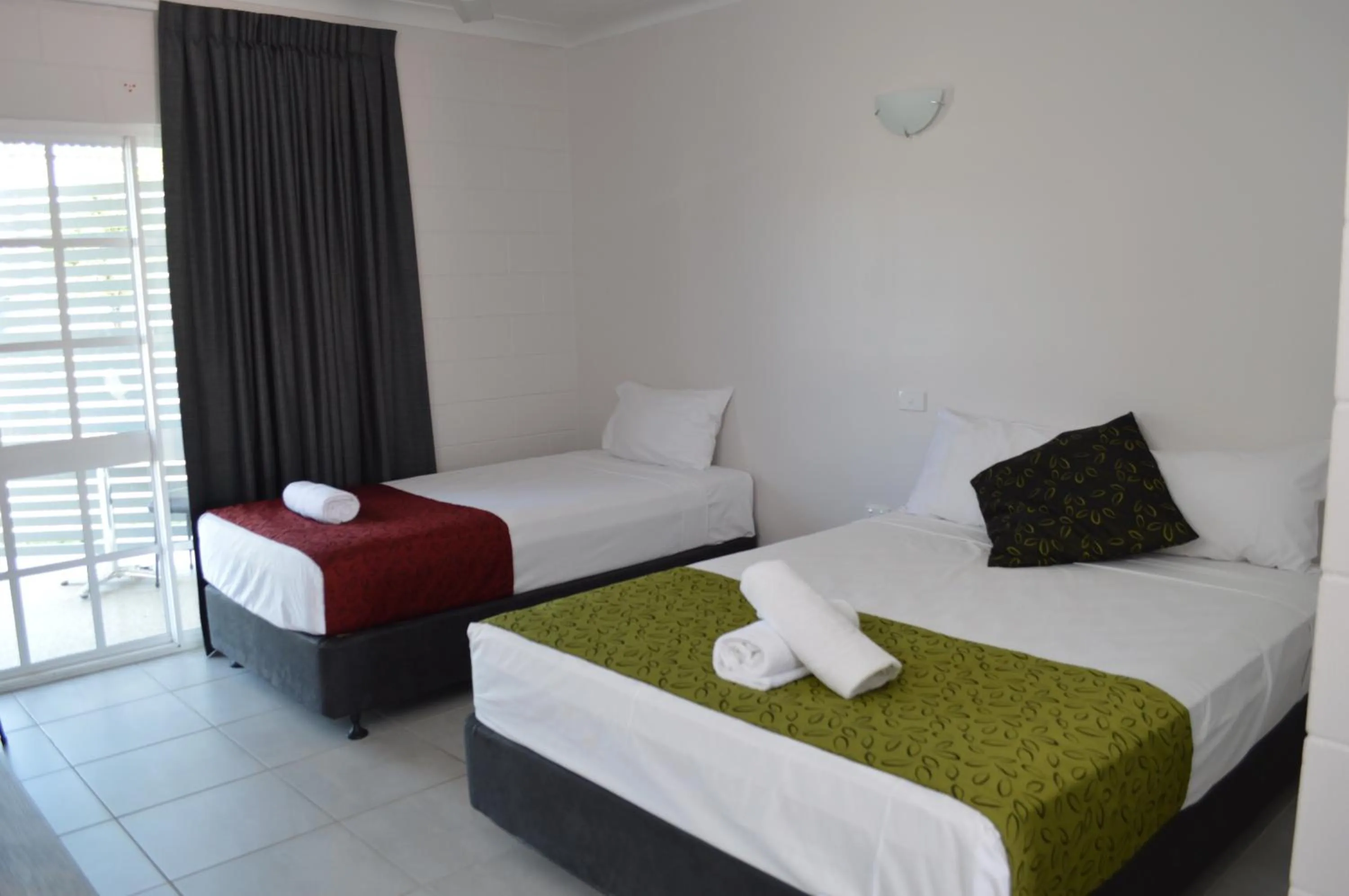 Bed in Monte Carlo Motor Inn