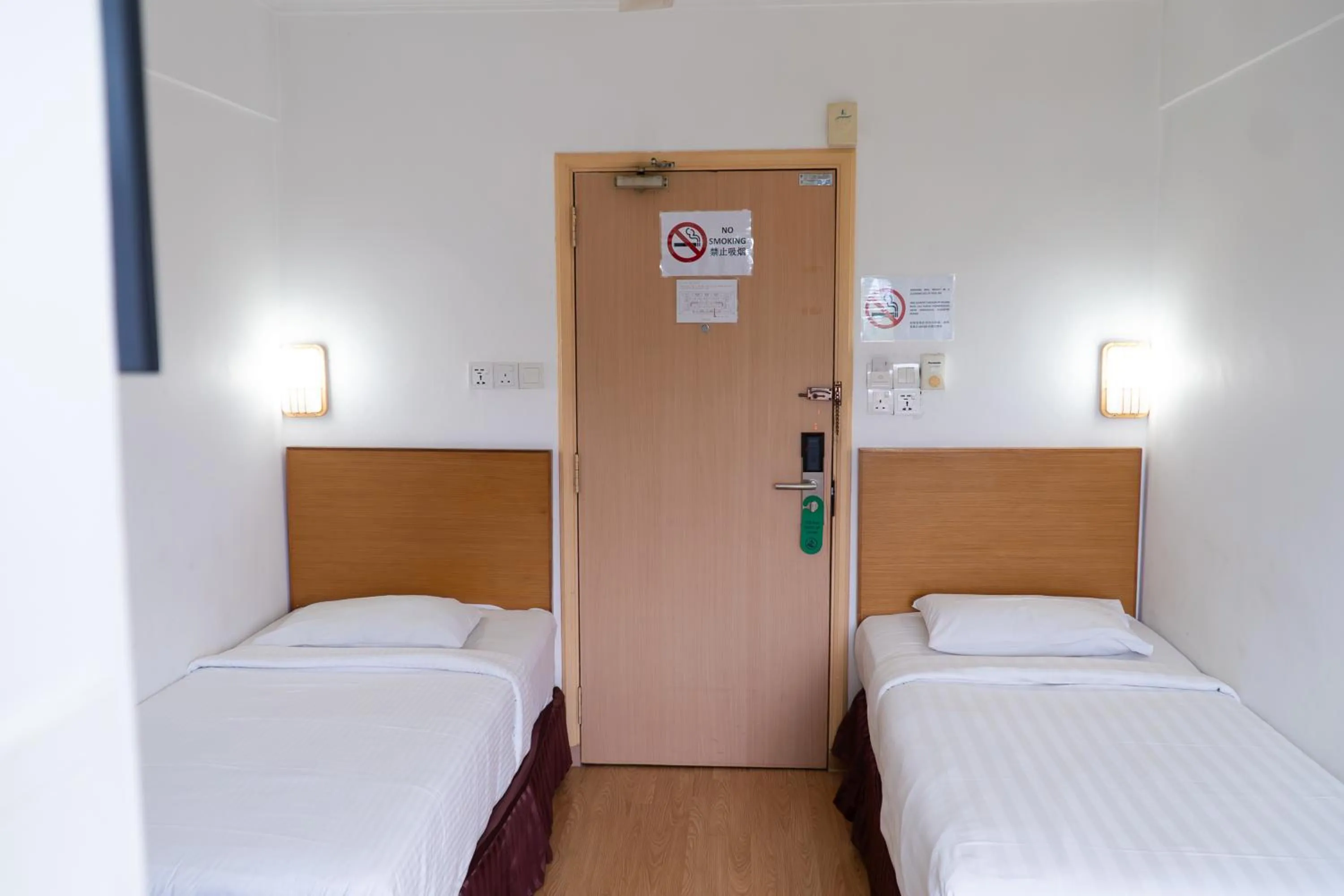 Bed in Borneo Suites Hotel