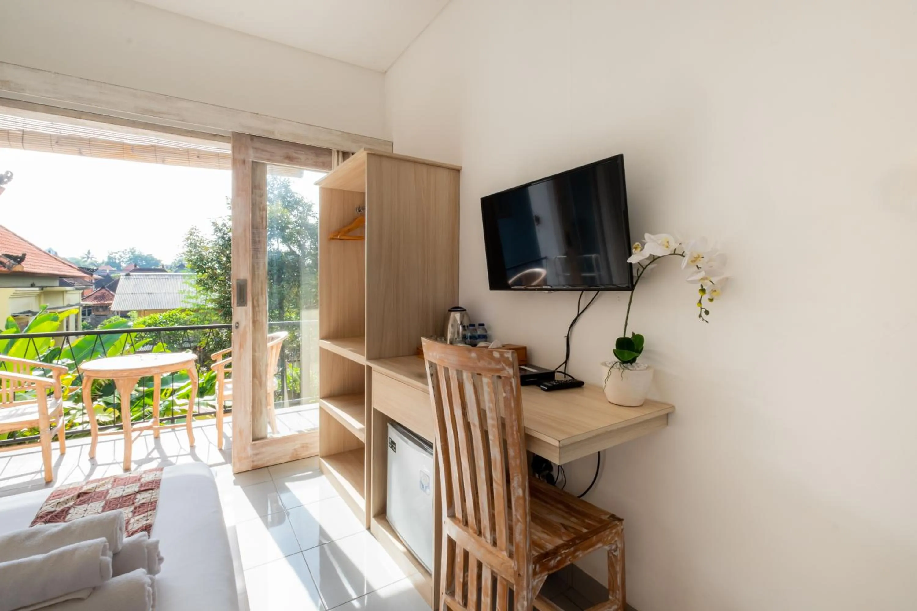 TV and multimedia in Suweta Homestay with Private Pool by Supala