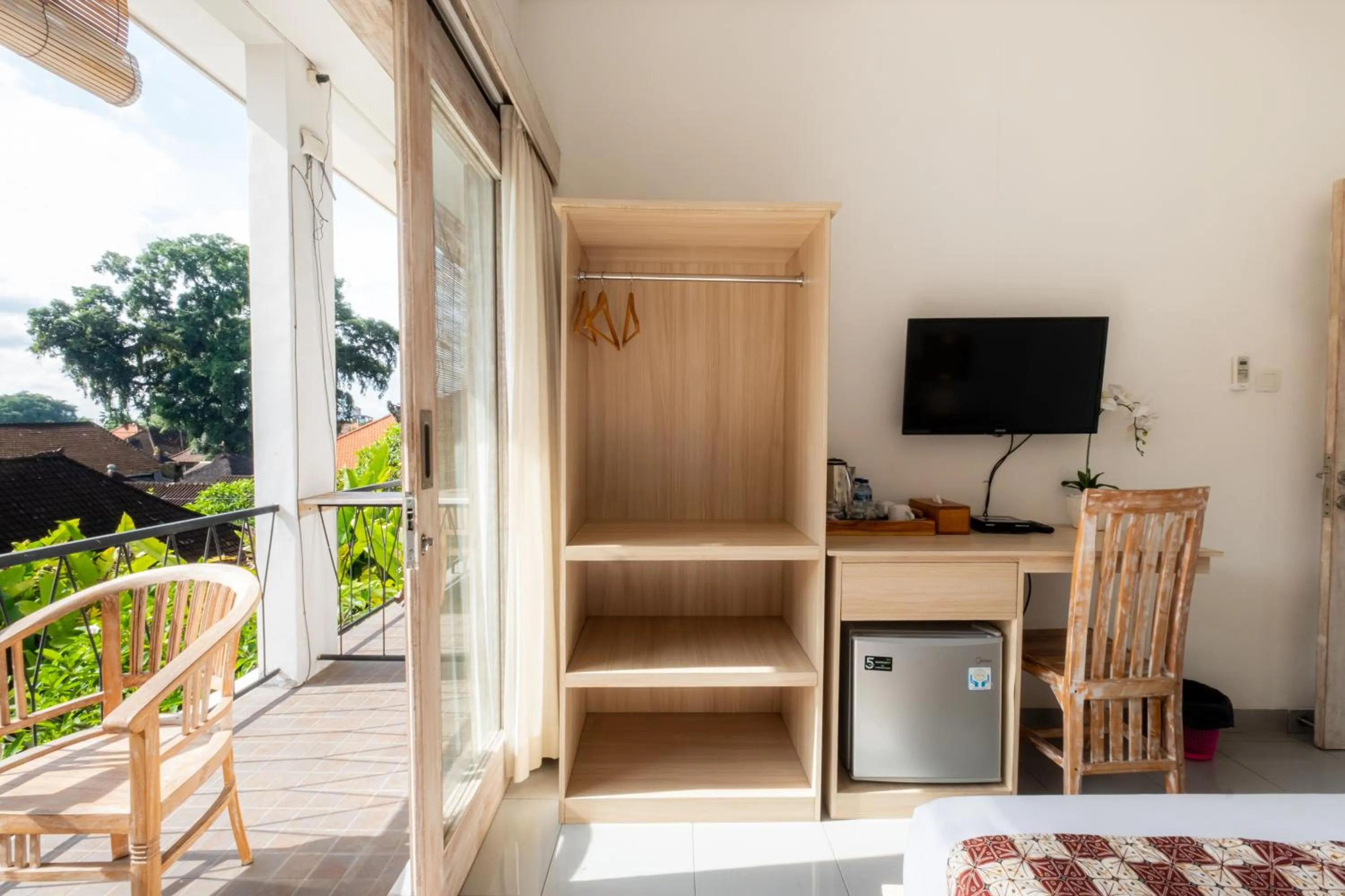 TV and multimedia in Suweta Homestay with Private Pool by Supala