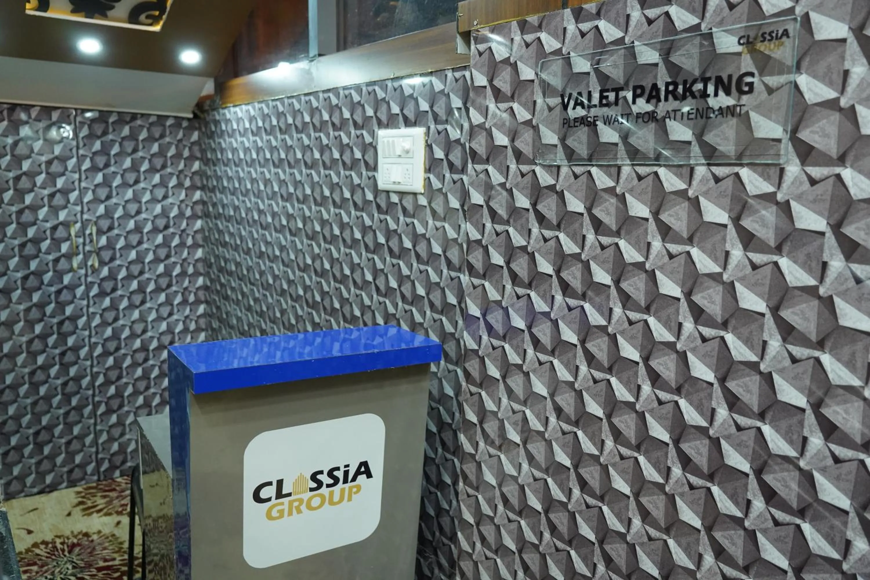 Property logo or sign in Classia Suites