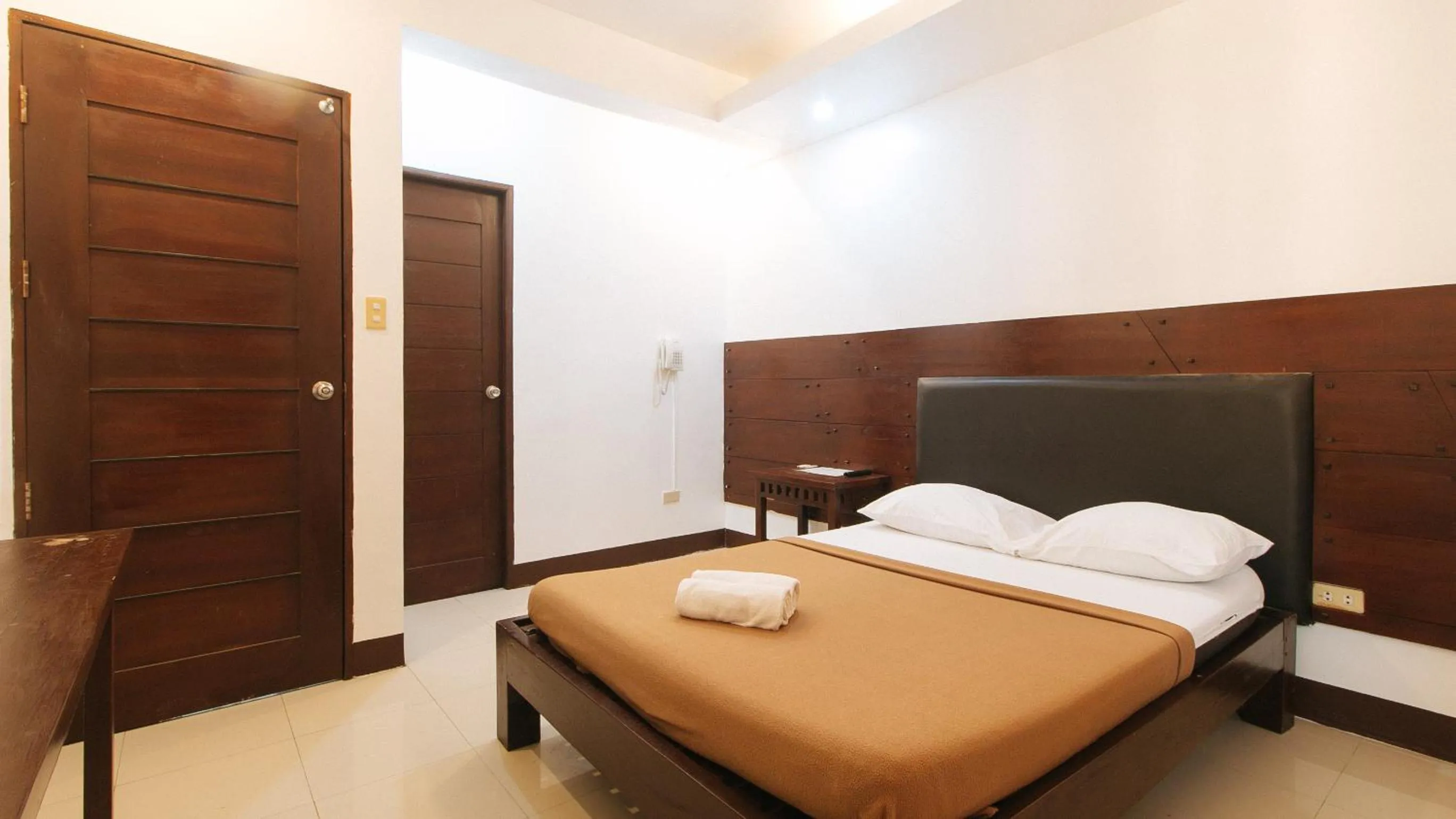 Bed in WestCourt Inn Ilocos Sur