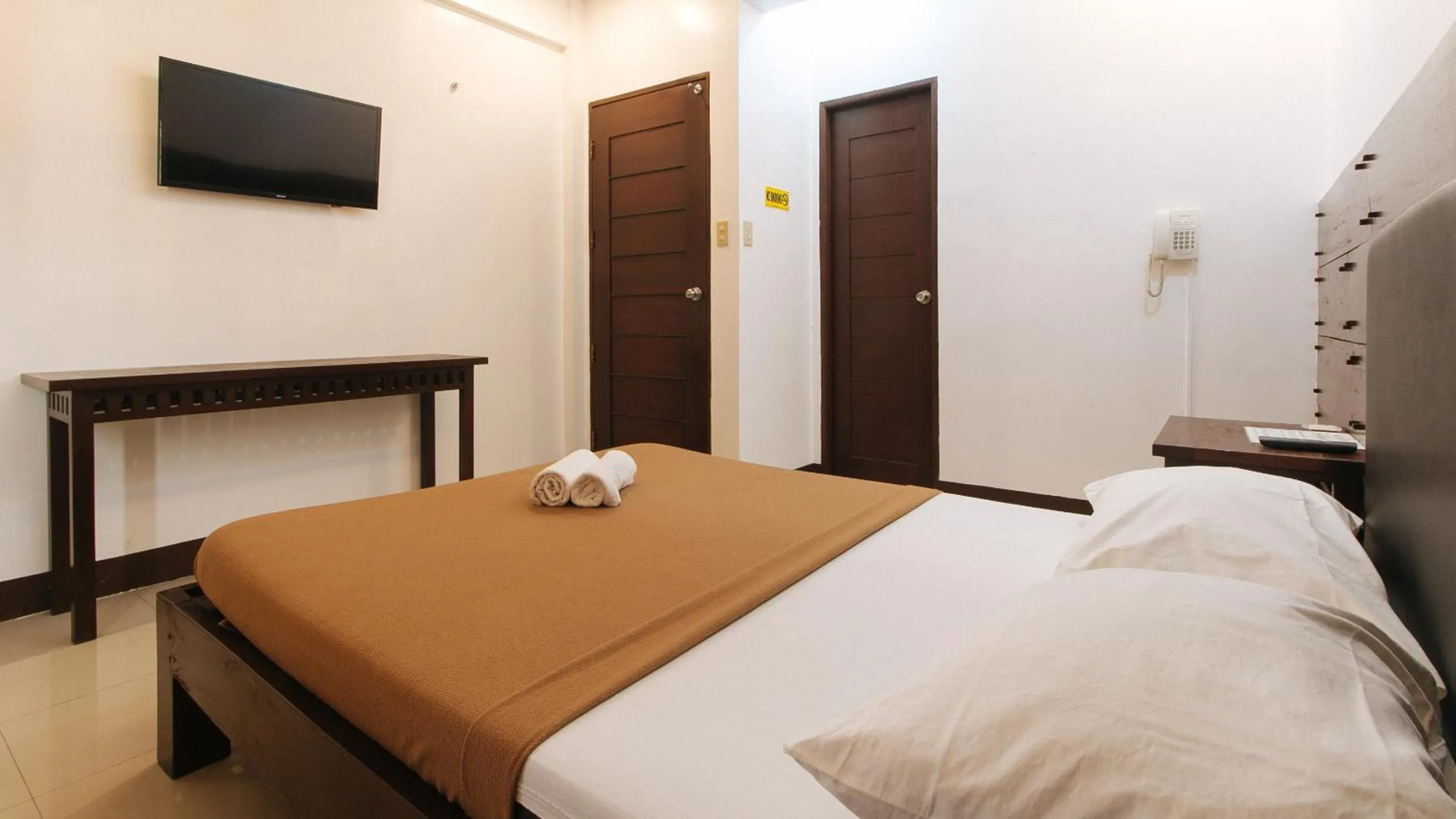 Bed in WestCourt Inn Ilocos Sur