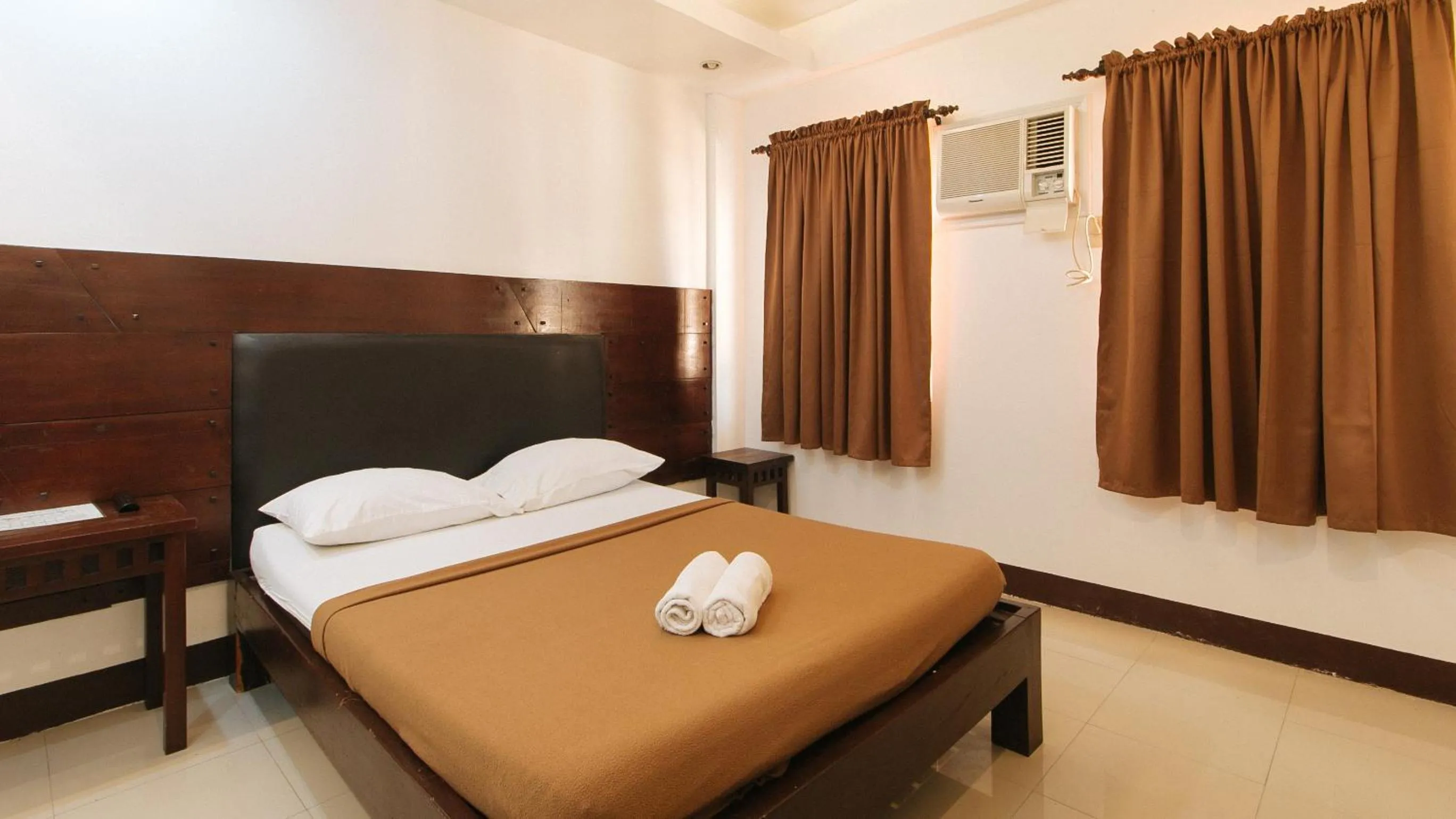 Bed in WestCourt Inn Ilocos Sur