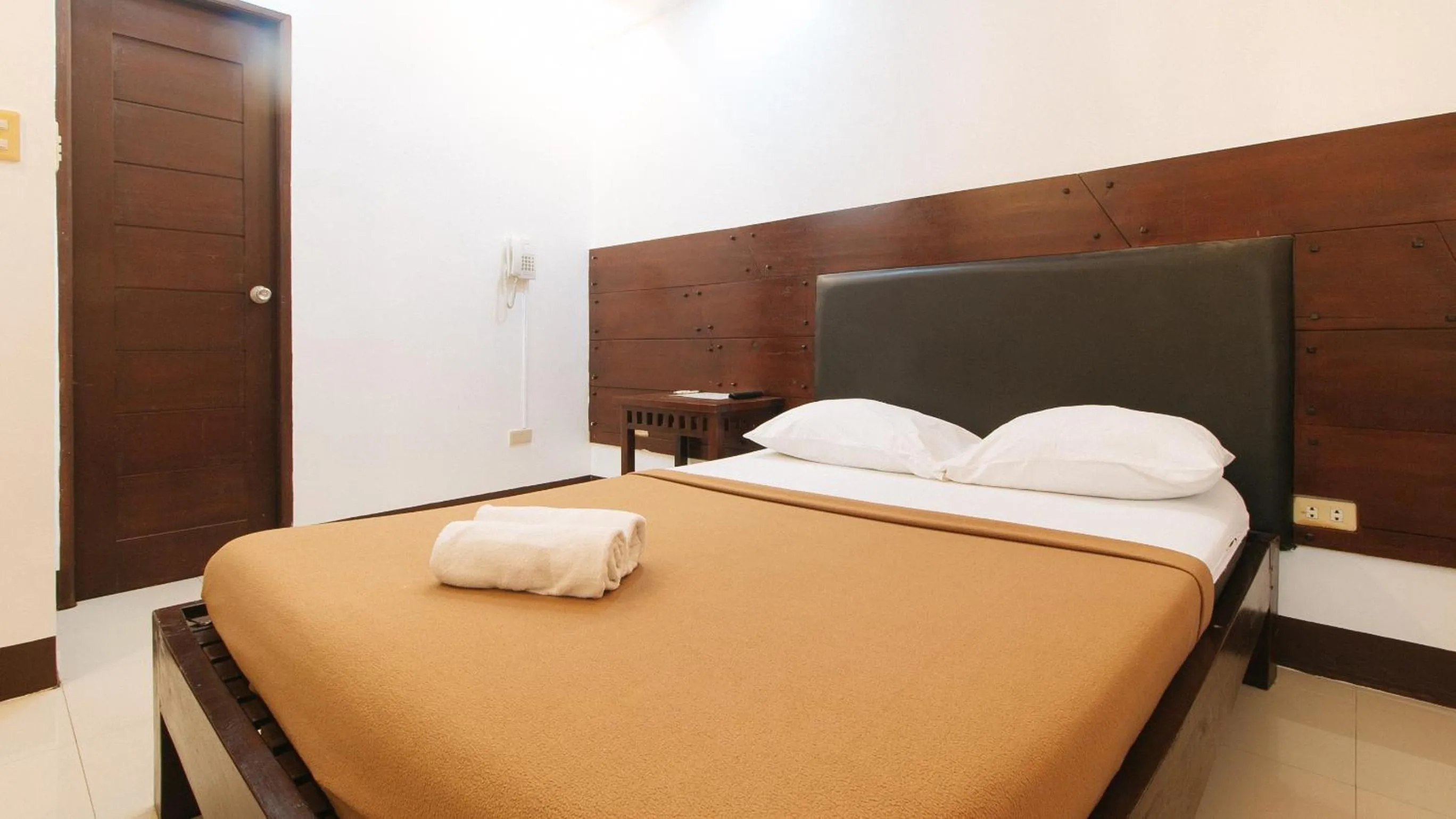 Bed in WestCourt Inn Ilocos Sur