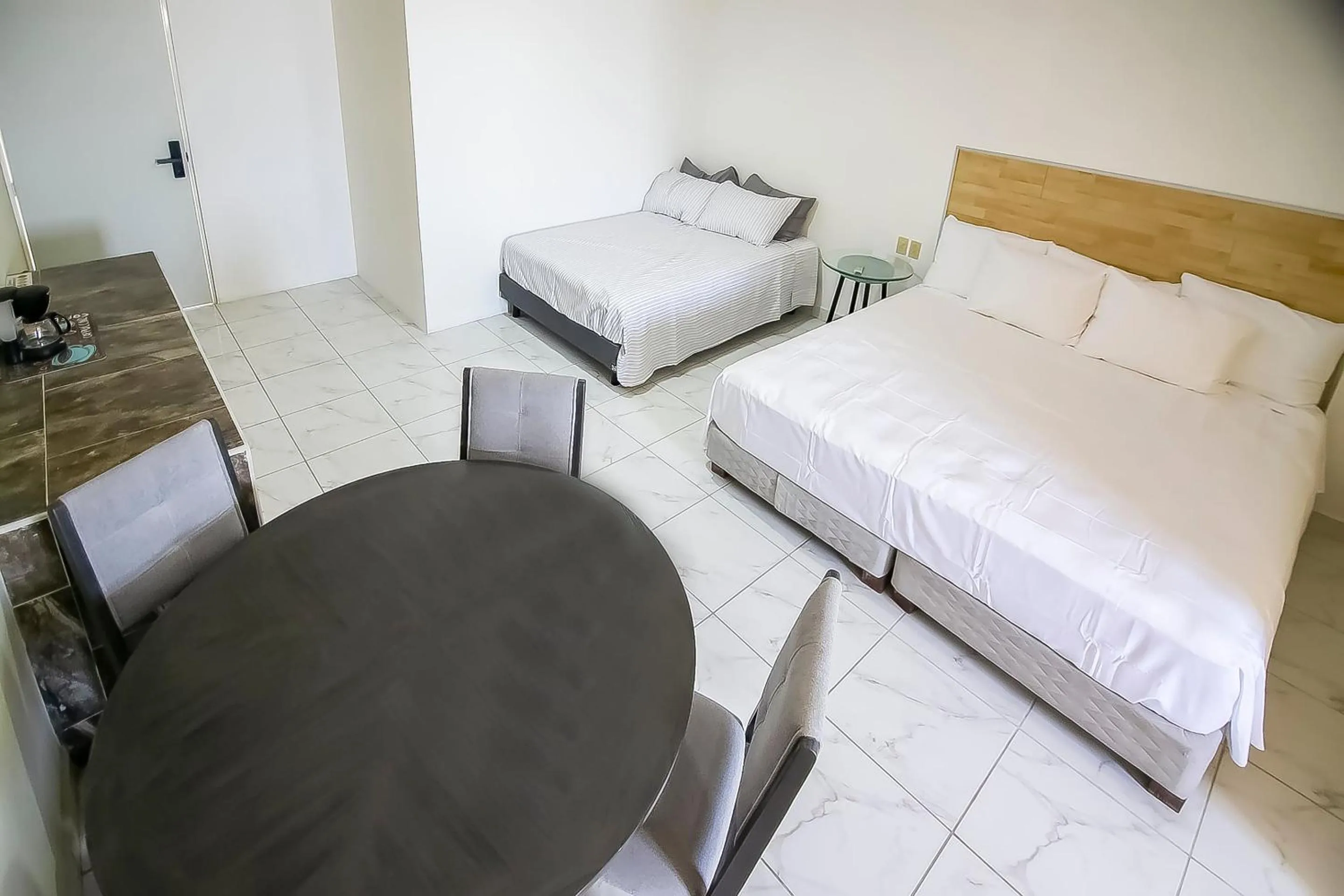 Bedroom, Bed in OYO Hotel Plaza Las Torres, Cabo San Lucas