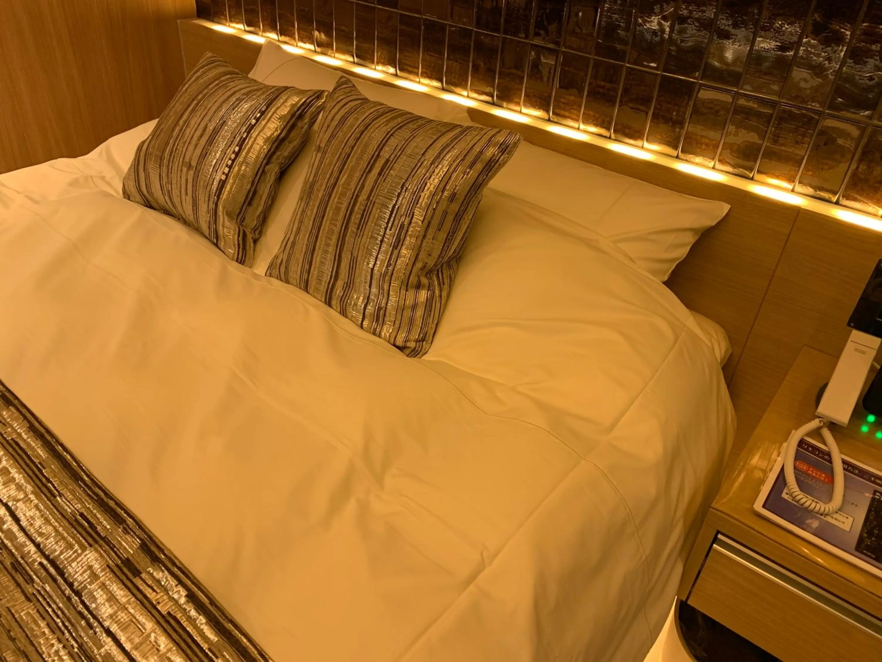 Bed in hotel brattostay ホテル ブラットステイ