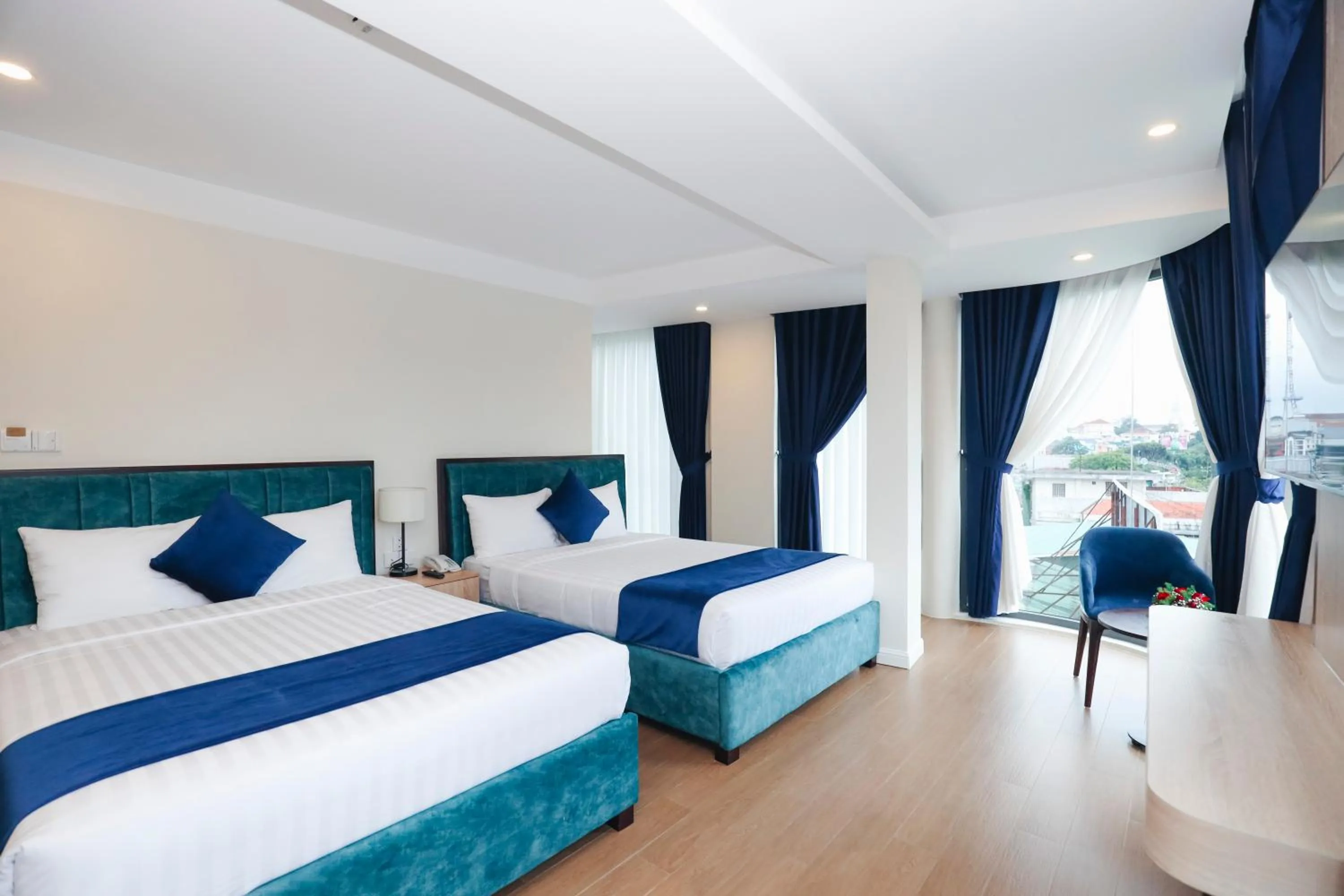 Bed in SANDALS FLORA HOTEL