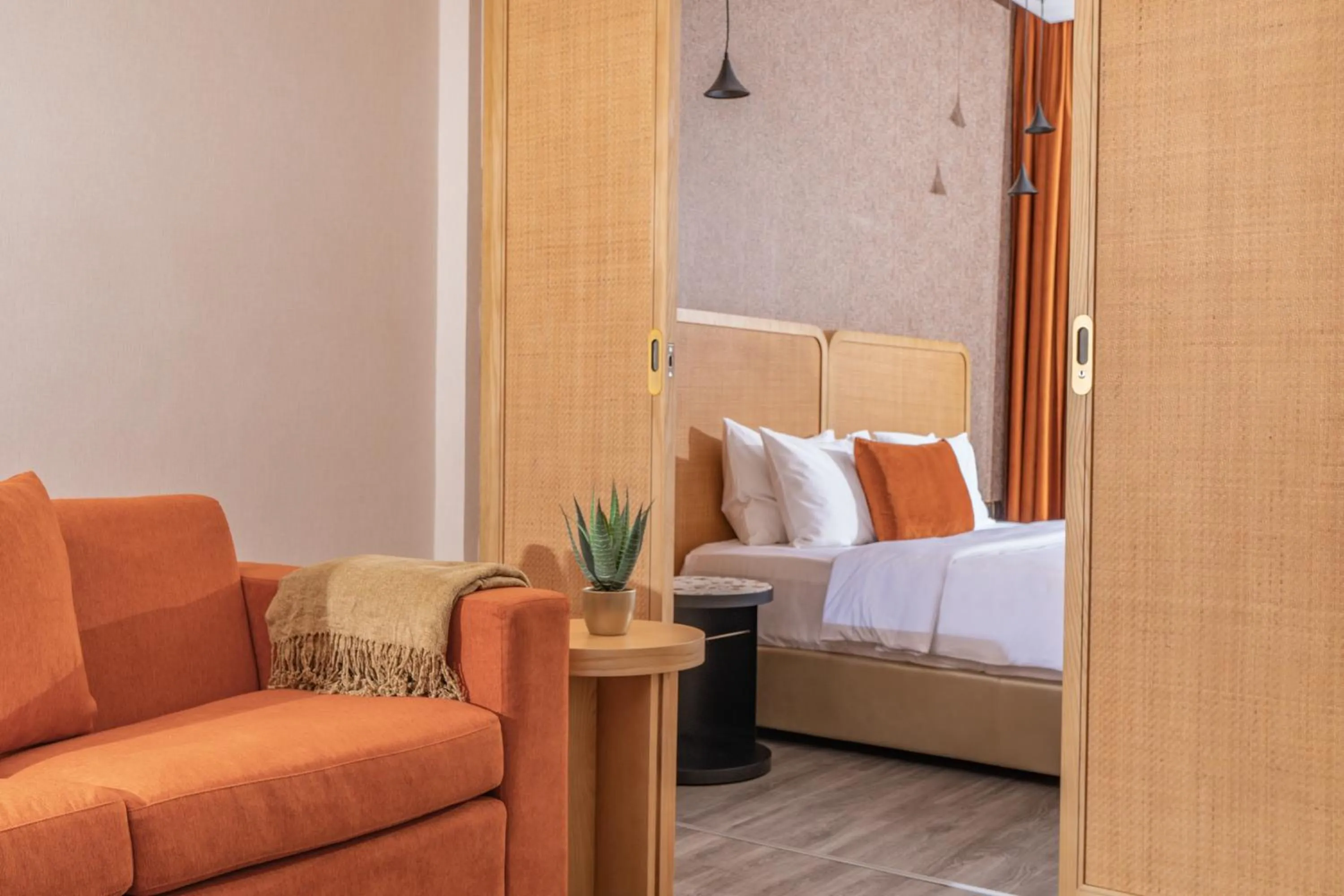 Living room, Bed in The House Hotel Al Khiran