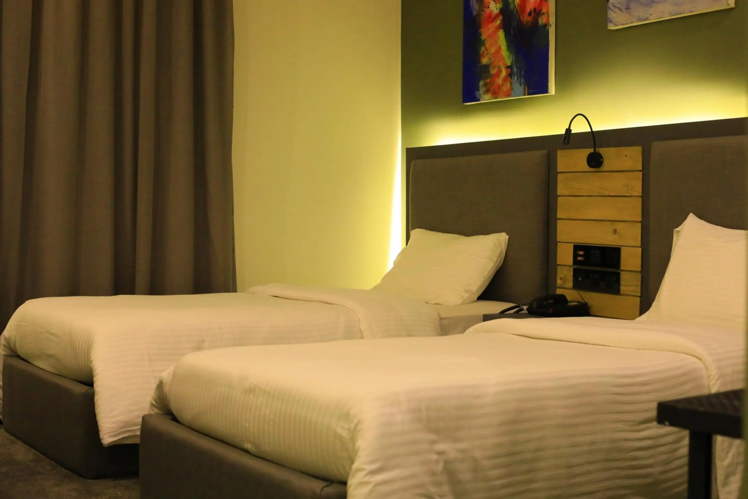 Bed in Aitch Boutique Hotel - an LIH Hotel