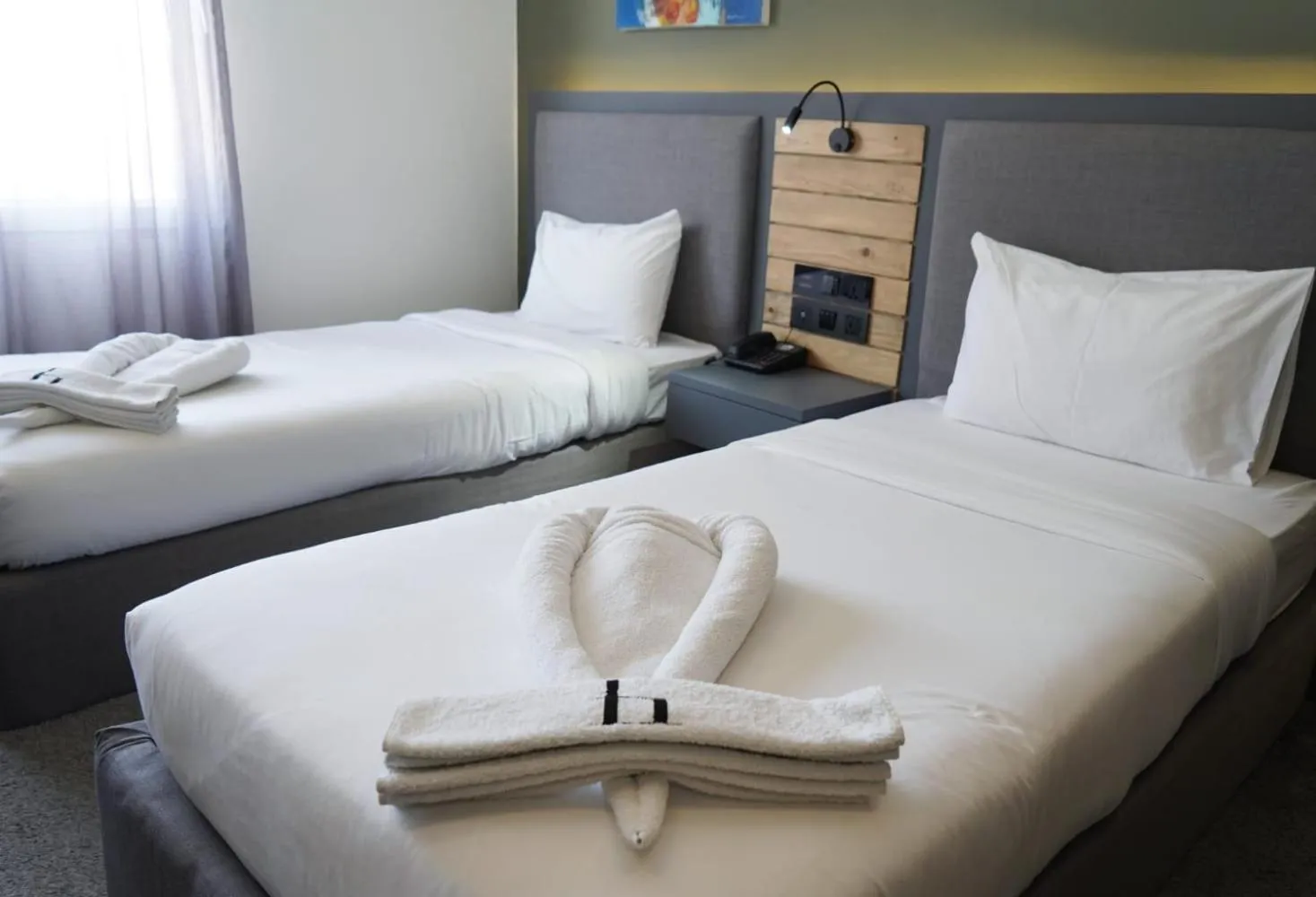 Bed in Aitch Boutique Hotel - an LIH Hotel